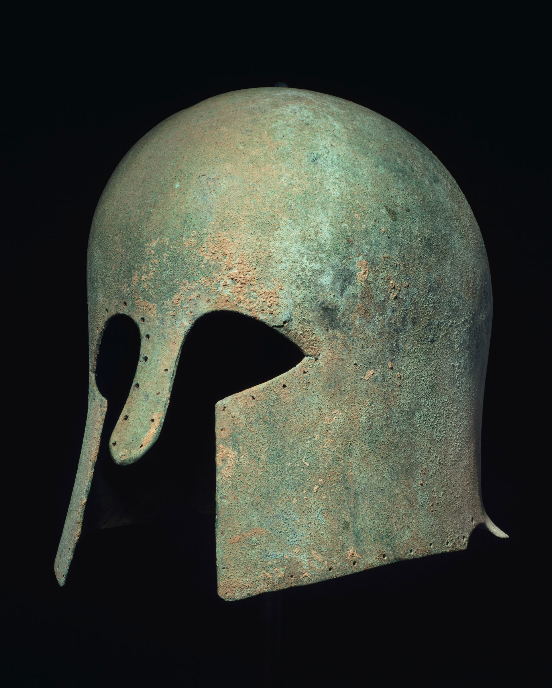 A Greek bronze helmet of Corinthian type, Archaic period, circa early 6th century BC. 9 in (22.8 cm) high. Estimate: $50,000-70,000. This lot is offered in Property from the Estate of Eugene V. Thaw on 30 October 2018 at Christie’s in New York