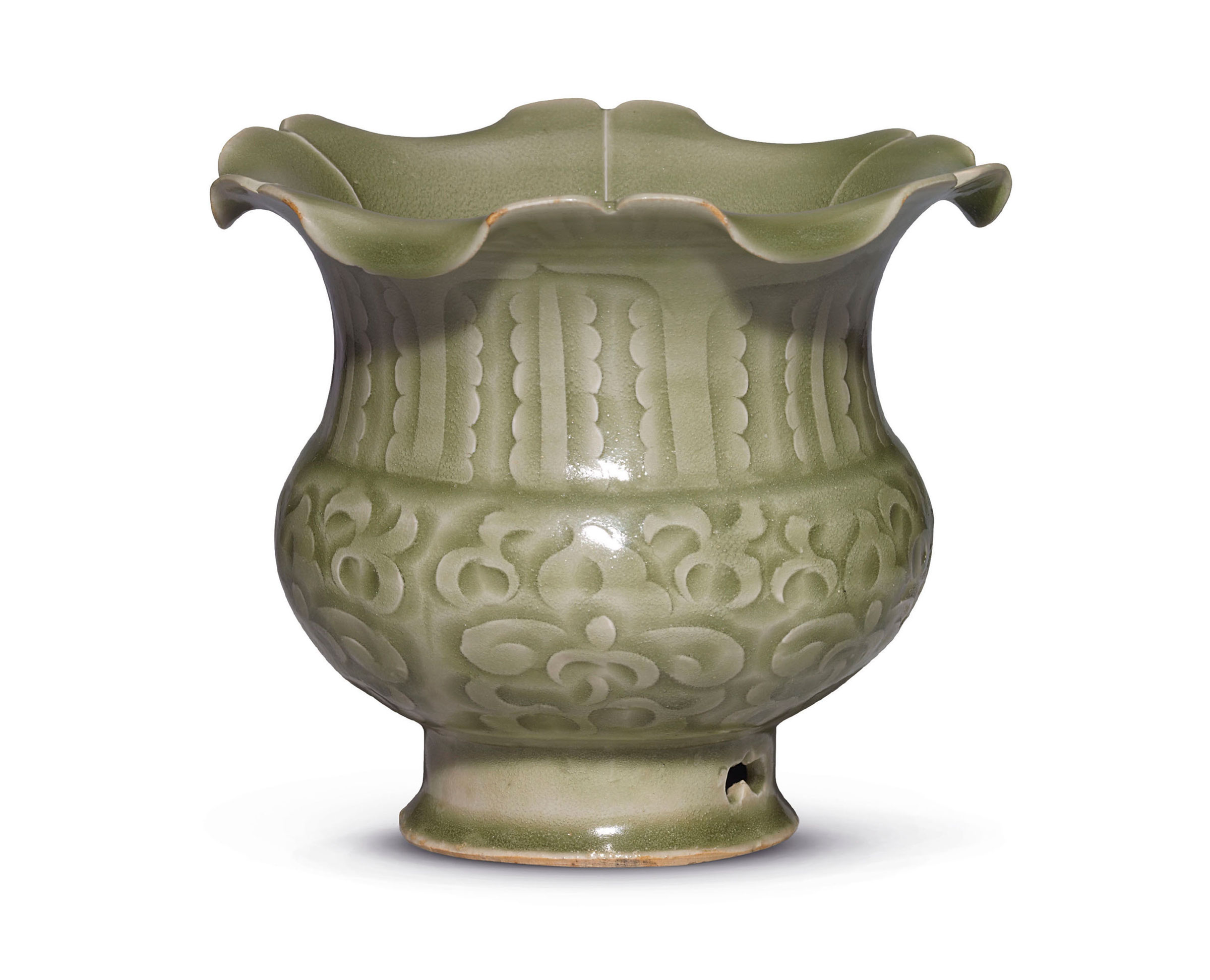 A very rare carved Yaozhou petal-rim jar, Northern Song dynasty, 11th century. 4⅝ in (11.8 cm) high. Sold for HK$1,960,000 on 2 December 2015 at Christie’s in Hong Kong