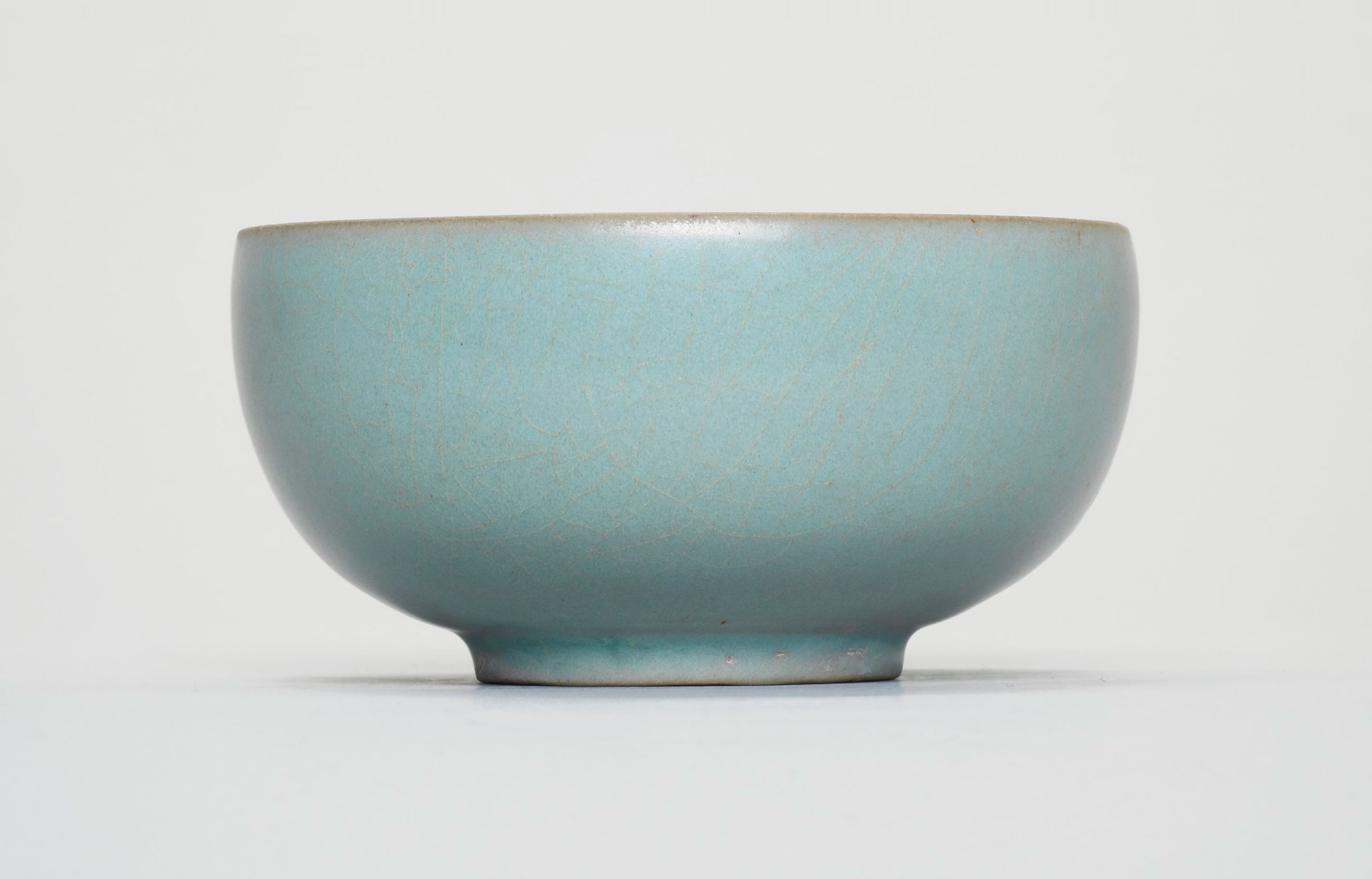 An important and extremely rare Ru ‘sky-blue’ tea bowl, Northern song dynasty, late 11th-early 12th century. 4  in (10.2  cm)  diam, Japanese wood boxes, one inscribed Seiji Chawan (celadon tea bowl). Estimate on request. Offered in Beyond Compare: A Thousand Years of the Literati Aesthetic (Evening Sale) on 26 November 2018 at Christie’s in Hong Kong