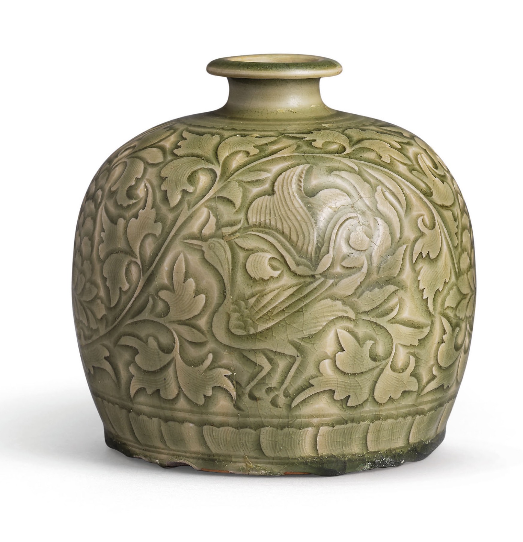 A rare Yaozhou carved ‘egrets and peony’ truncated meiping, Northern Song dynasty (960–1127). 5⅞  in (14.6 cm) wide. Sold for HK$2,125,000 on 30 May 2018 at Christie’s in Hong Kong