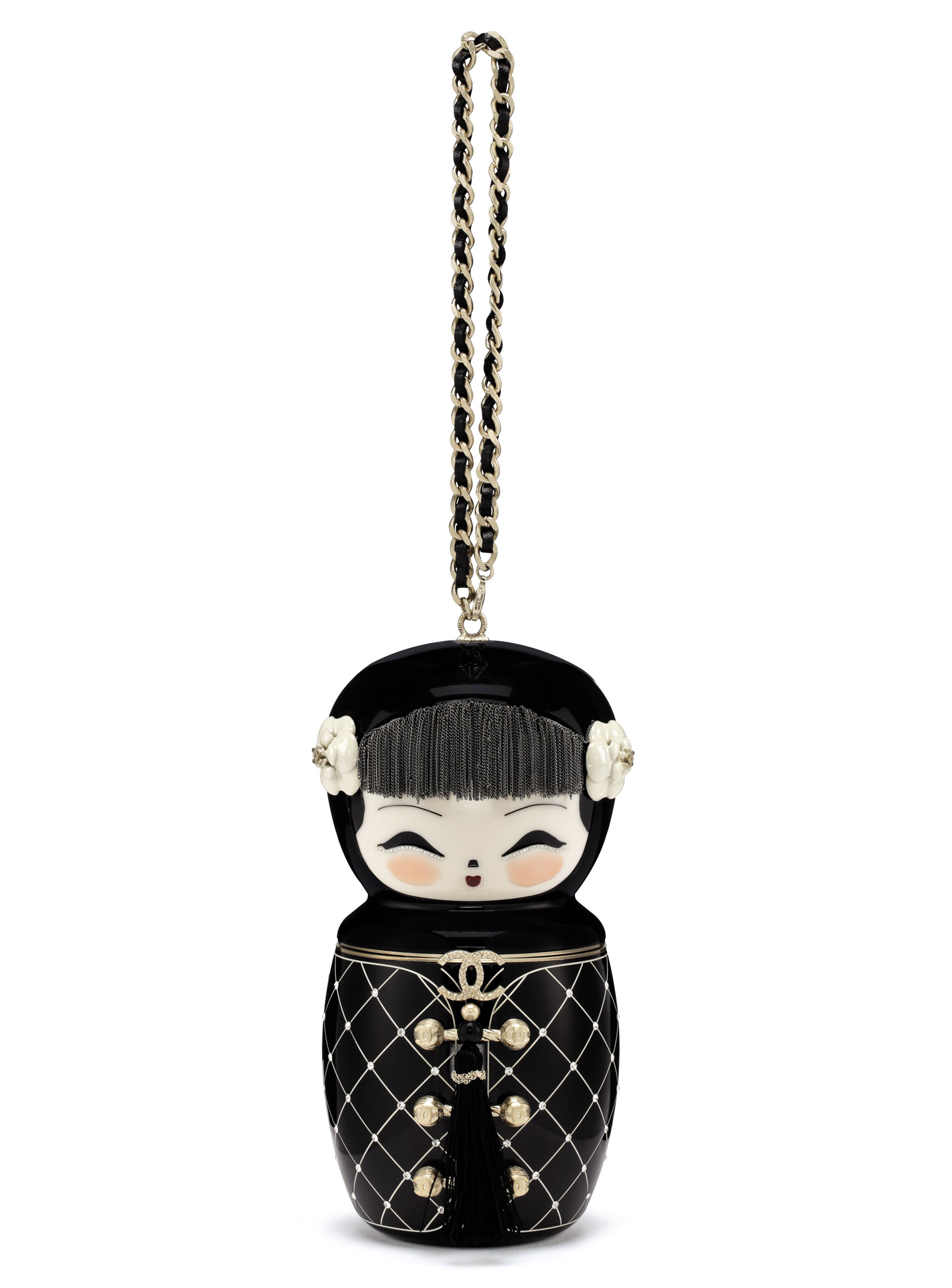 A Métiers d'Art Paris-Shanghai black lucite Matryoshka evening bag with gold hardware, Chanel, 2010. 12 w x 19 h x 7 d cm. Sold for $32,500 on 19 June 2018, online