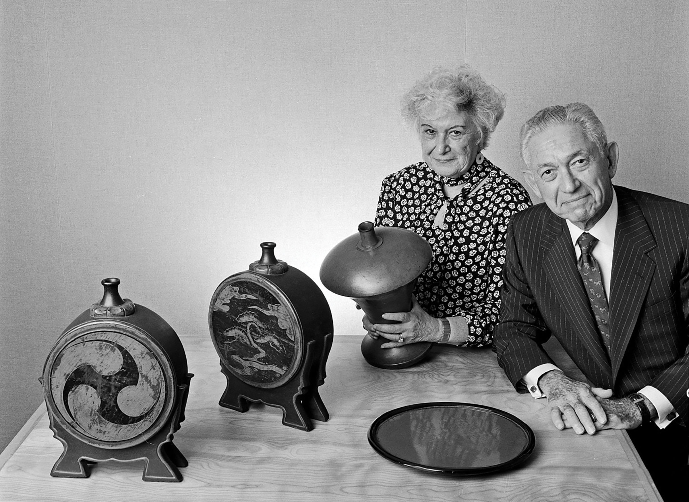 Florence and Herbert Irving photographed with pieces from their collection