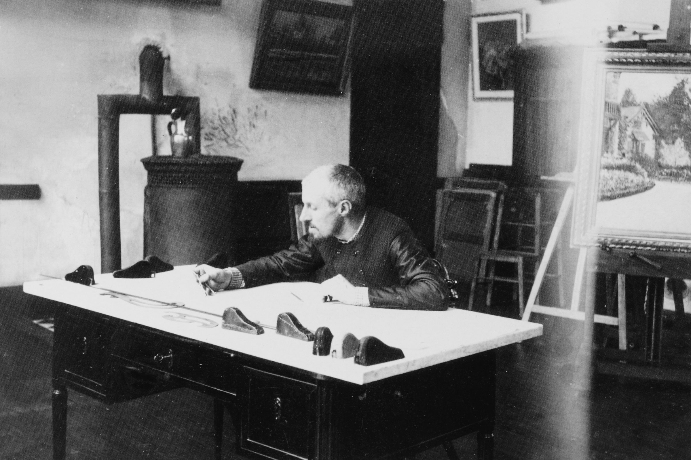 Gustave Caillebotte at his naval architect’s drafting table, circa 1891-1892. Photograph by Martial Caillebotte