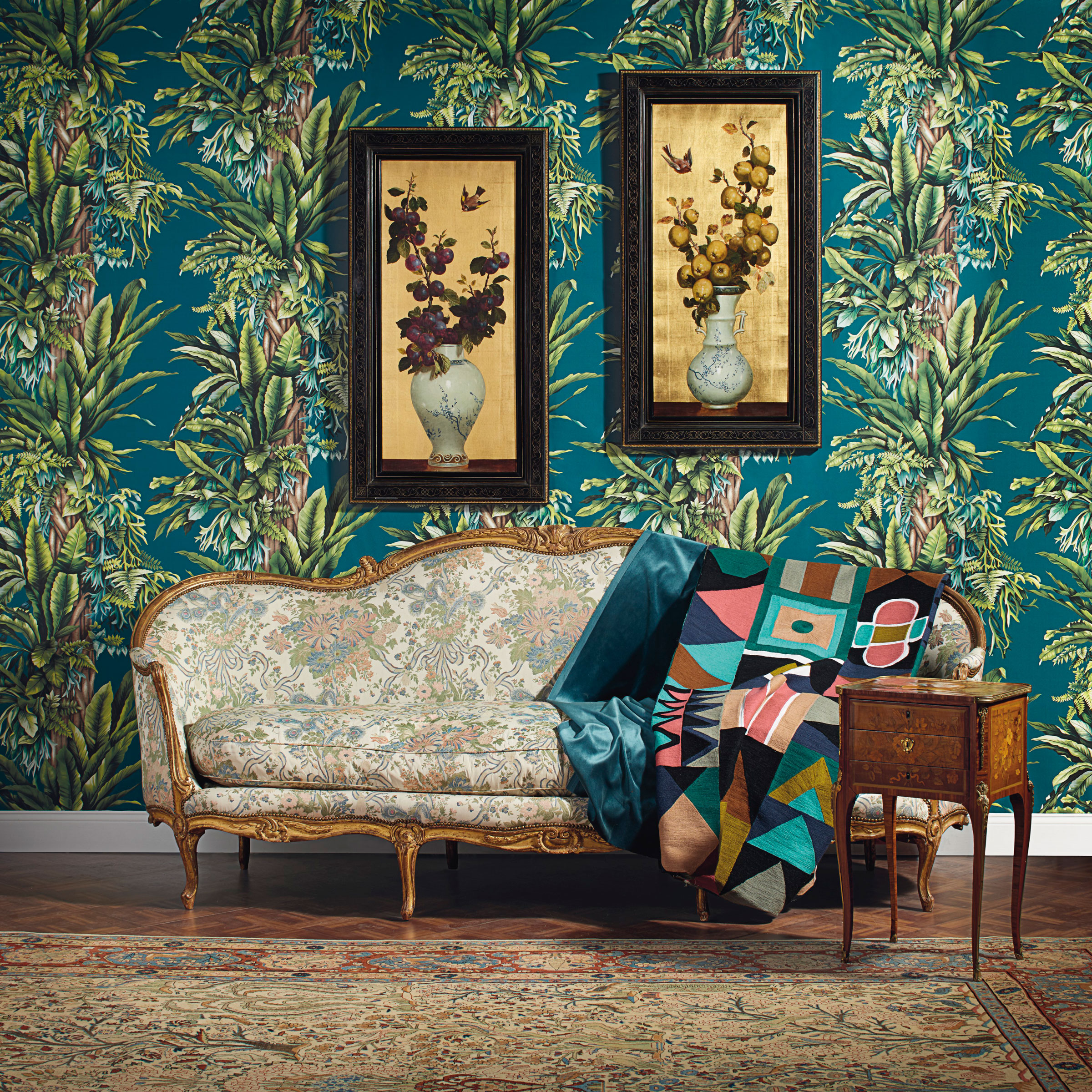 William Hughes (British, 1842-1901), a pair of still lives with apples and plums in a Japanese vase. Oil and gold paint on canvas. Estimate: $5,000-8,000.&nbsp;A late Louis XV giltwood canap&eacute; en corbeille, by Jean-Baptiste Gourdin, circa 1760. Estimate: $7,000-10,000.&nbsp;A late Louis XV ormolu-mounted tulipwood, sycamore and marquetry writing table by Guillaume Kemp, circa 1765. Estimate $4,000-6,000.&nbsp;A Dabir Kashan carpet, central Persia, first quarter 20th century. Estimate: $6,000-8,000.  Offered in The Collector: English &amp; European 18th &amp; 19th Century Furniture, Ceramics, Silver &amp; Works of Art on 9 April at Christie&rsquo;s in New York. Fabric used as wall covering: Pachira by Pierre Frey.&nbsp;Fabric on couch: Ndebeles by Pierre Frey