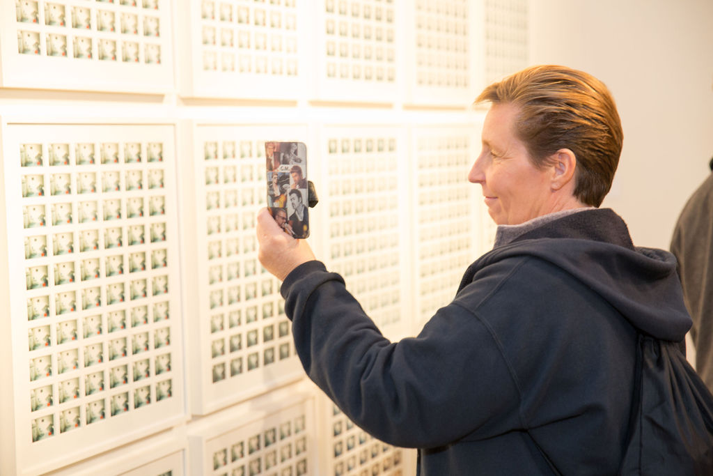 A photographic souvenir for one of the many George Michael fans who have come to see his art collection