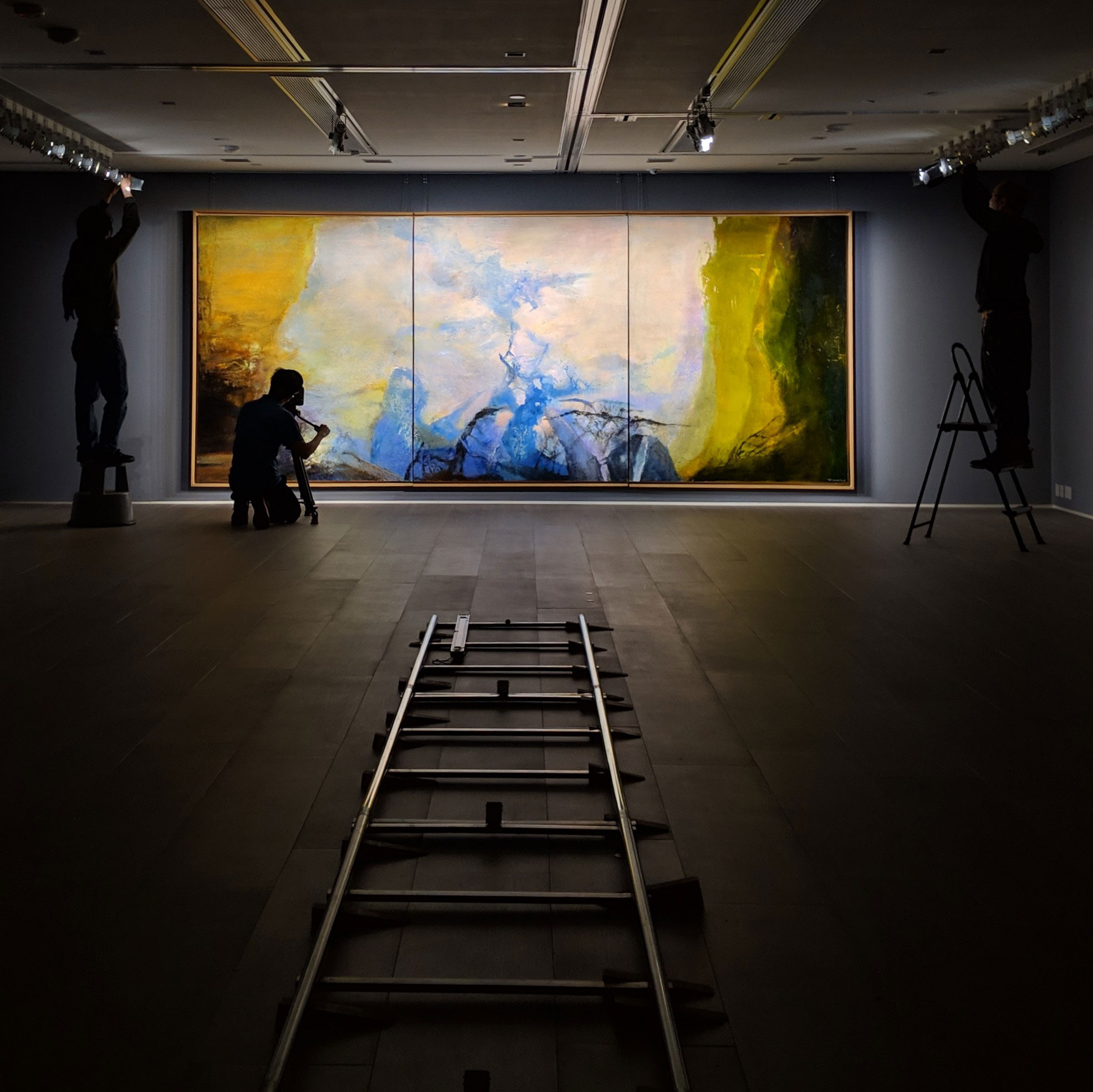 Zao Wou-Ki’s Triptyque 1987-1988 being installed at Christie’s ahead of its Hong Kong preview