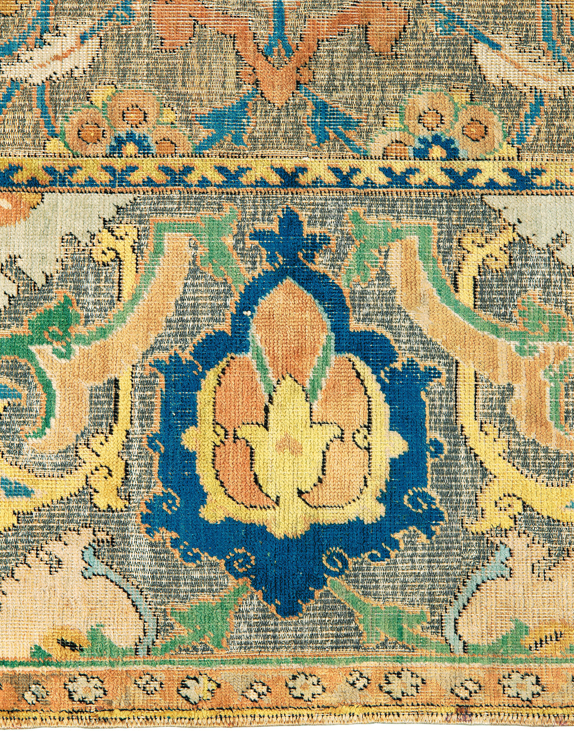 The amount of metal thread still extant in this carpet illustrates its excellent condition