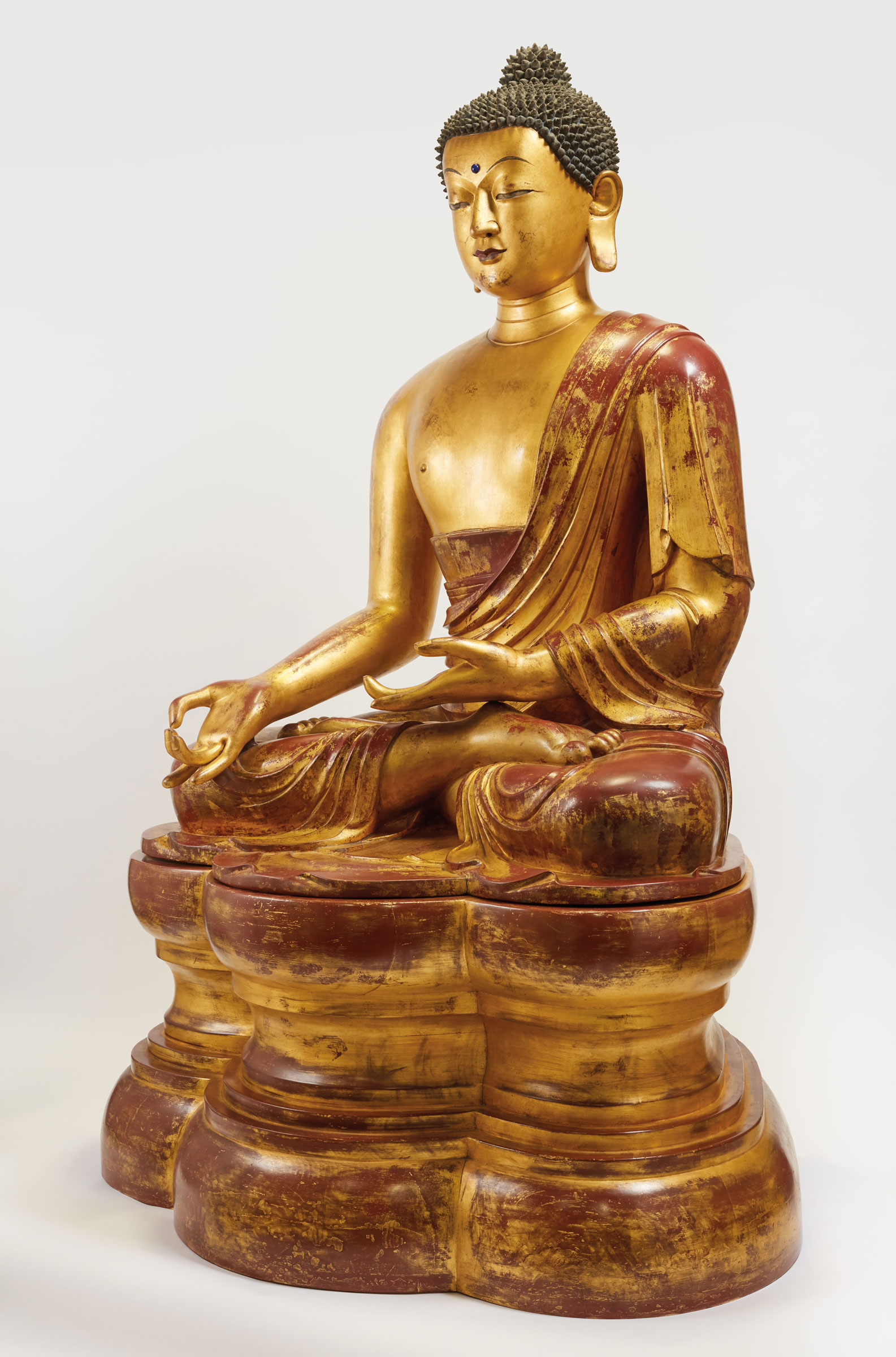 A highly important and monumental imperial gilt-lacquered wood figure of the Medicine Buddha, Qing Dynasty, 18th century. The figure: 68 in (172.7 cm.) high; overall height including gilt-lacquered wood pedestal: 95 in (241.2 cm) high. Estimate: HK$30,000,000-50,000,000. Offered in Glories of Buddhist Arts on 29 May 2019 at Christie’s in Hong Kong