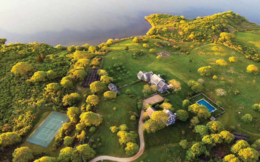 Encompassing 340 acres and more than a mile of private Atlantic Ocean beachfront, Jackie Kennedy Onassis's Red Gate Farm is one of the most desirable estates in New England