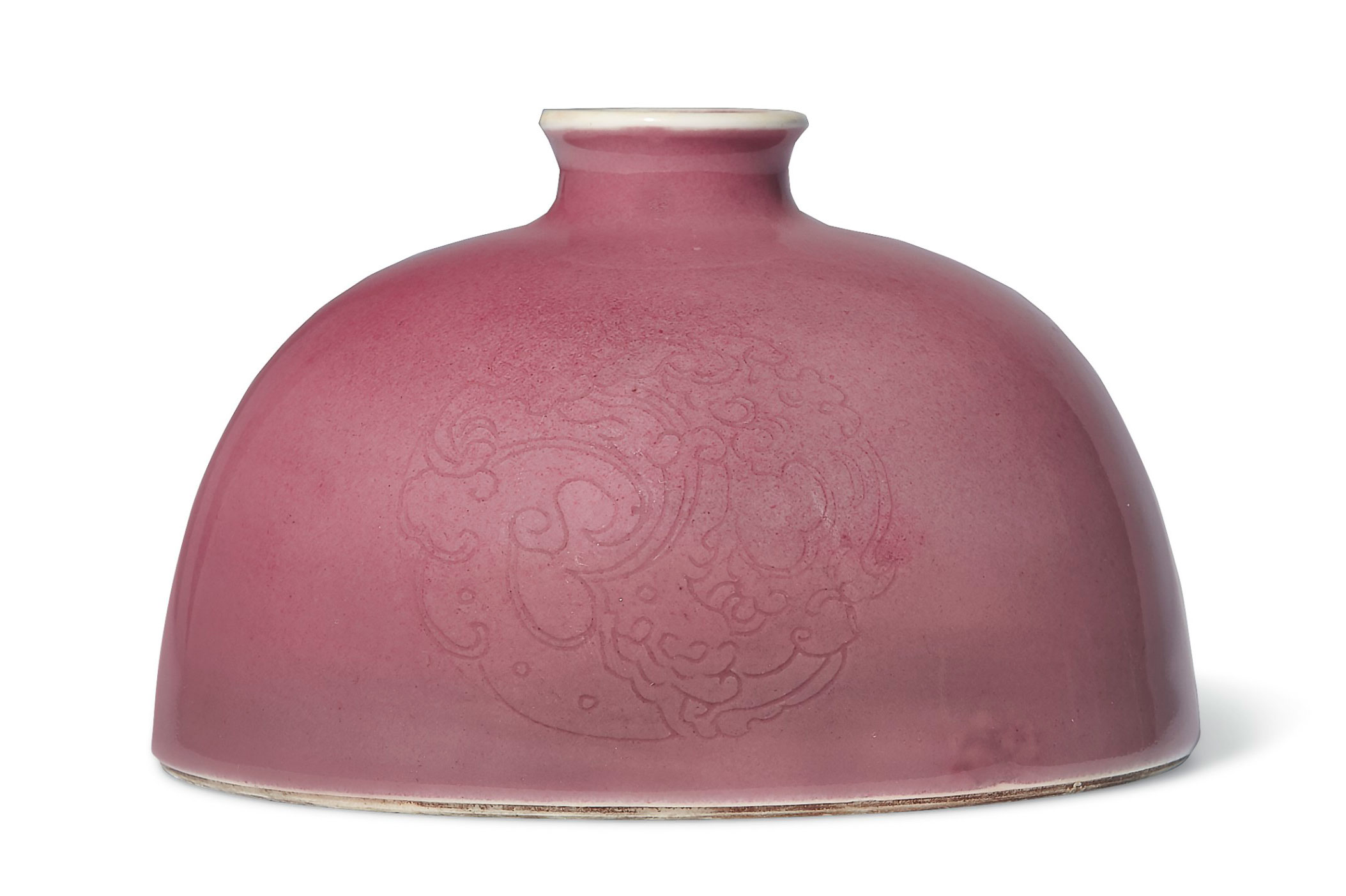 A peachbloom-glazed domed waterpot, taibai zun, Kangxi six-character mark in underglaze blue and of the period (1662-1722). 4⅞  in (12.3  cm)  diam. Estimate: $80,000-120,000. Offered in Chinese Art from The Art Institute of Chicago  on 12 September 2019 at Christie’s in New York