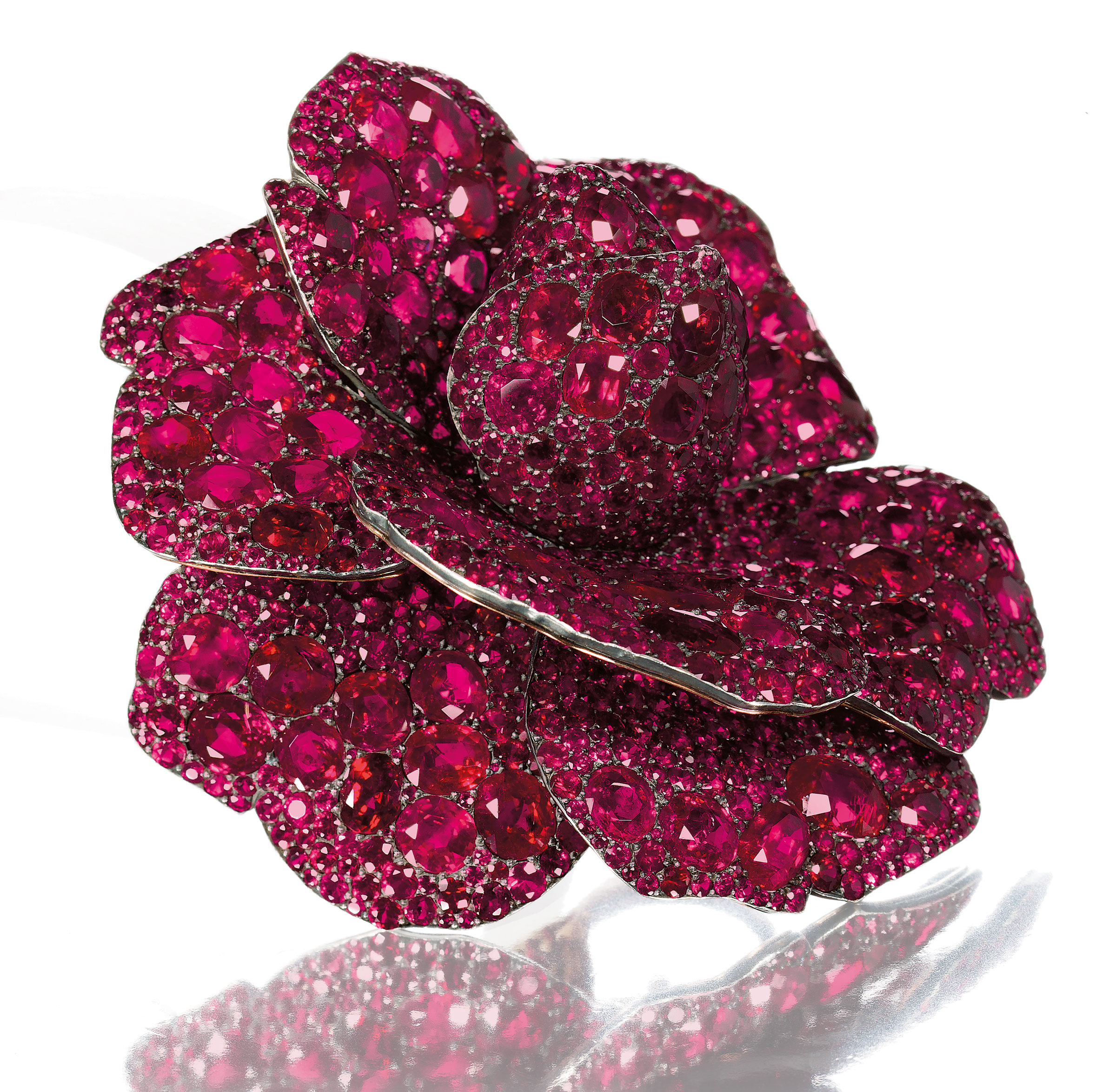 A ruby flower brooch by JAR. Sold for CHF 4,003,000 on 14 May 2012 at Christie’s in Geneva
