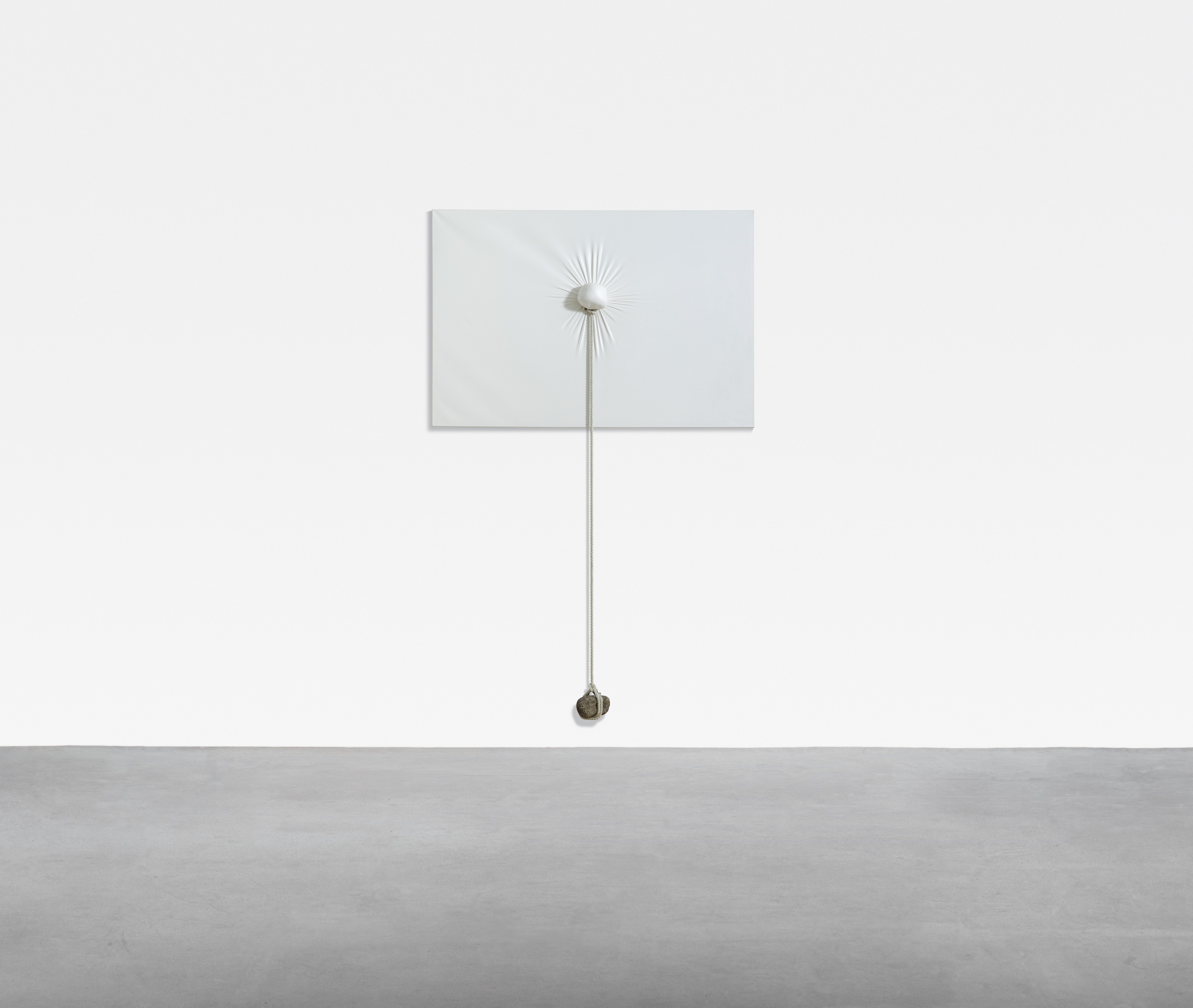 Nobuo Sekine (b. 1942), Phase of Nothingness — Cloth and Stone, 1994. Liquitex on canvas, plastic fibre rope and found rock. 119⅝ x 76⅜ x 7⅛ in (304 x 194 x 18 cm). Estimate: £50,000-70,000. Offered in Post-War and Contemporary Art Day Auction on 5 October 2019 at Christie’s in London