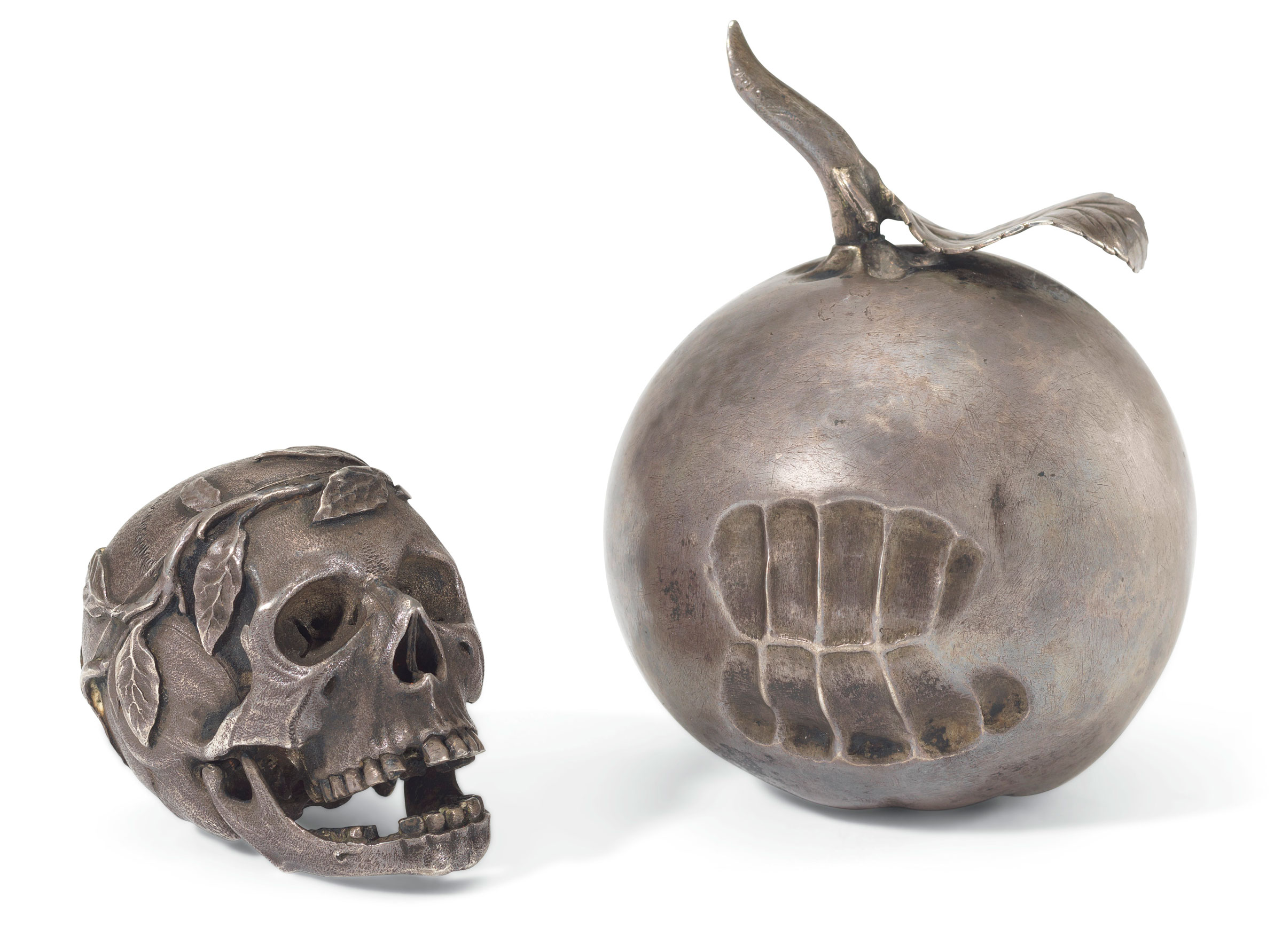 A reminder of mortality, the silver apple has the inscription: ‘From man came woman, from woman came sin, from sin came death’. A rare 17th-century silver pomander, 1628, silver, leather case. Sold for £65,000 on 25 October 2019 at Christie’s in London