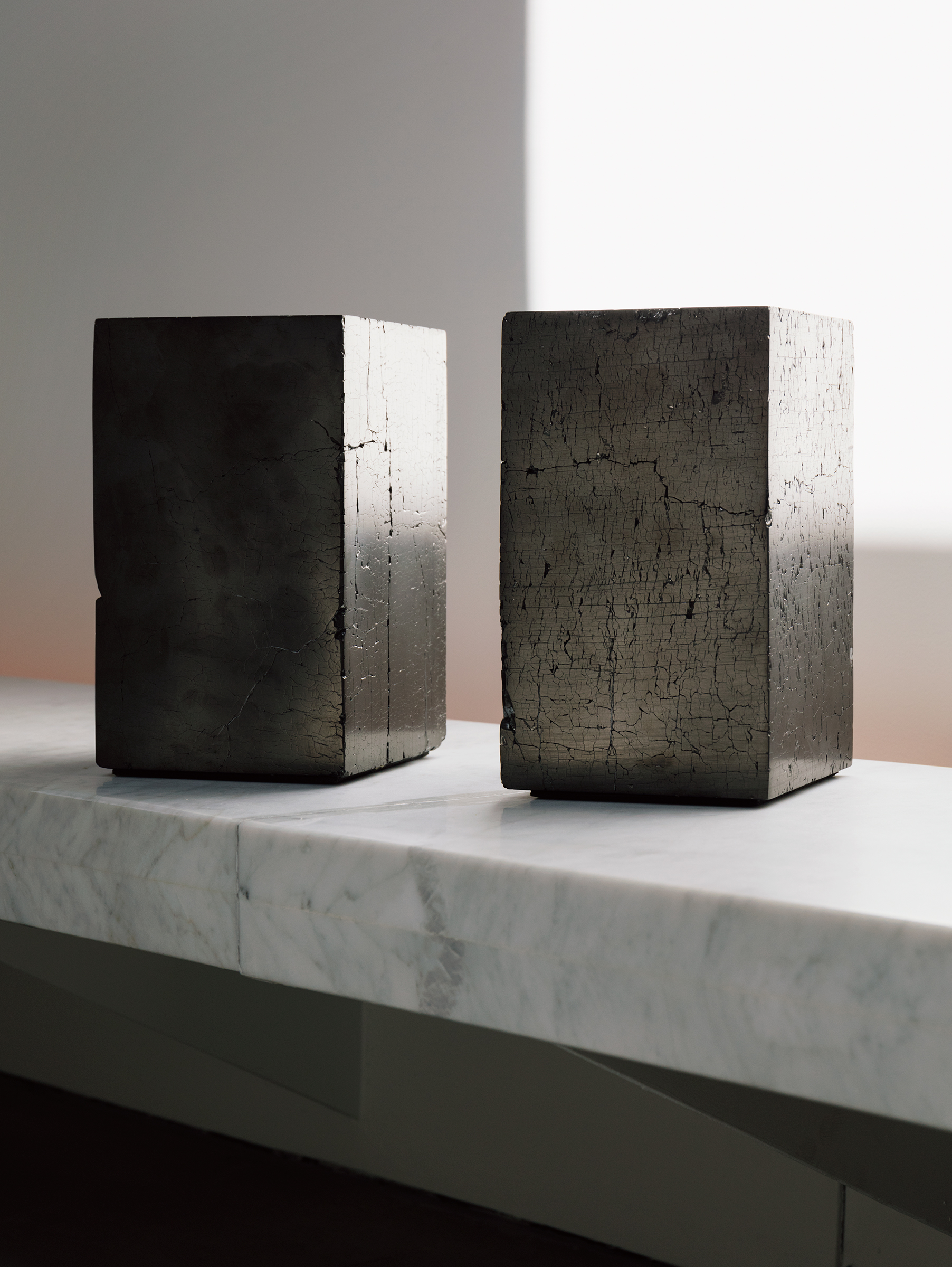 Jim Zivic’s Coal, displayed on the bench that runs the length of the first-floor living space