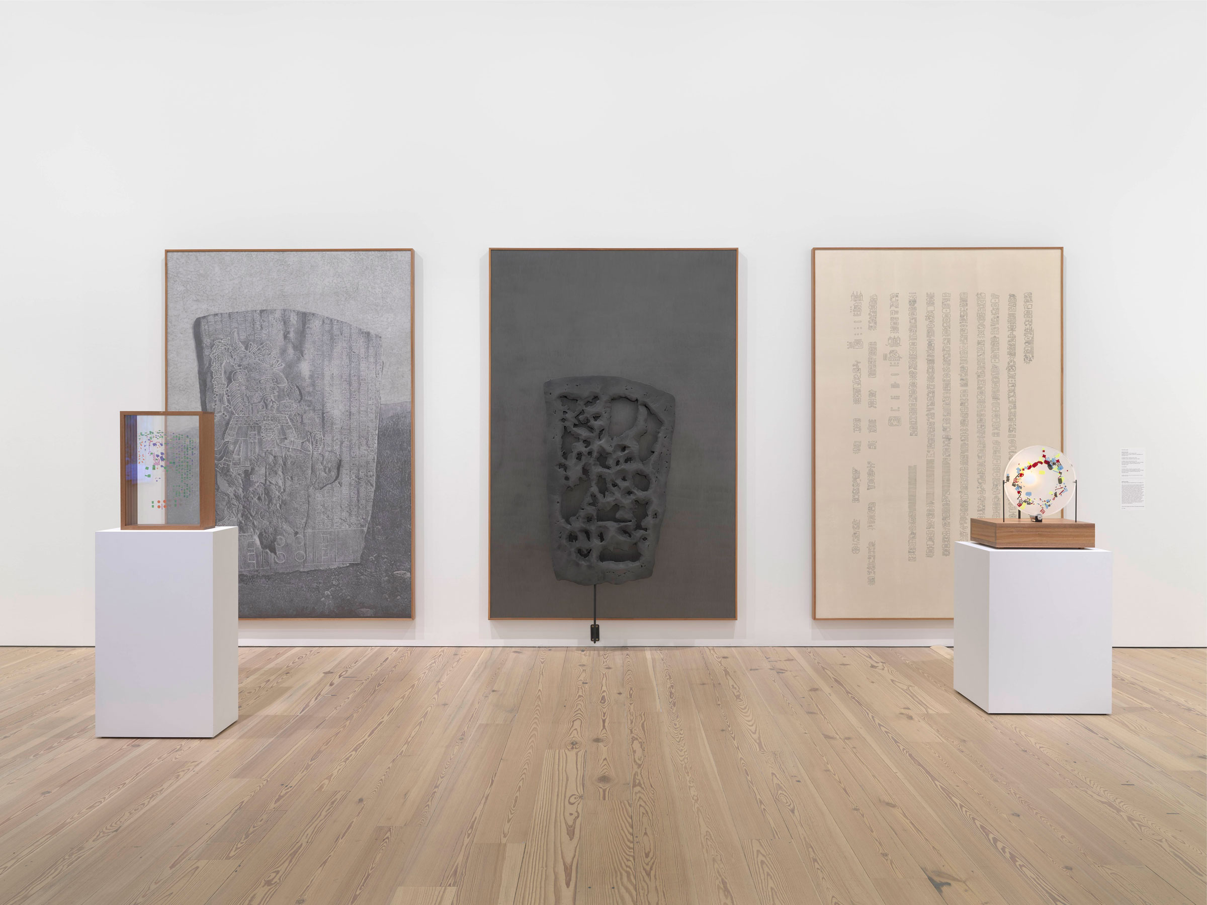 Installation view of the Whitney Biennial 2019 (Whitney Museum of American Art, New York, May 17-September 22, 2019). From left: Gala Porras-Kim, La Mojarra Stela and Its Shapes, 2019; Gala Porras-Kim, La Mojarra Stela Negative Space, 2019; Gala Porras-Kim, La Mojarra Stela Illuminated Text and La Mojarra Stela Incidental Conjugations, 2019. Photograph by Ron Amstutz