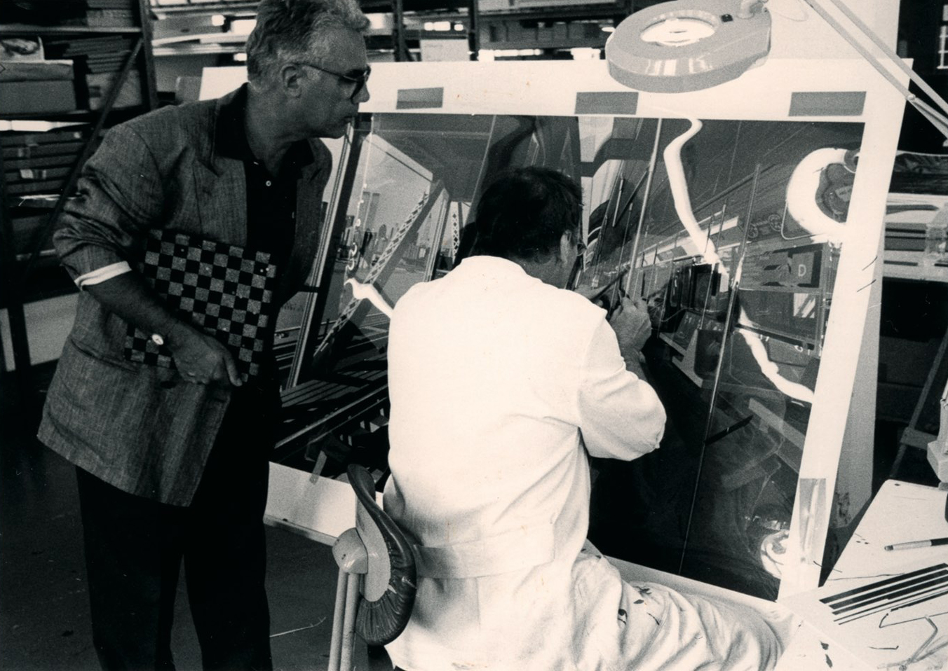 Michael Domberger and Richard Estes at work on D-Train at the company’s Stuttgart workshop. Courtesy Domberger