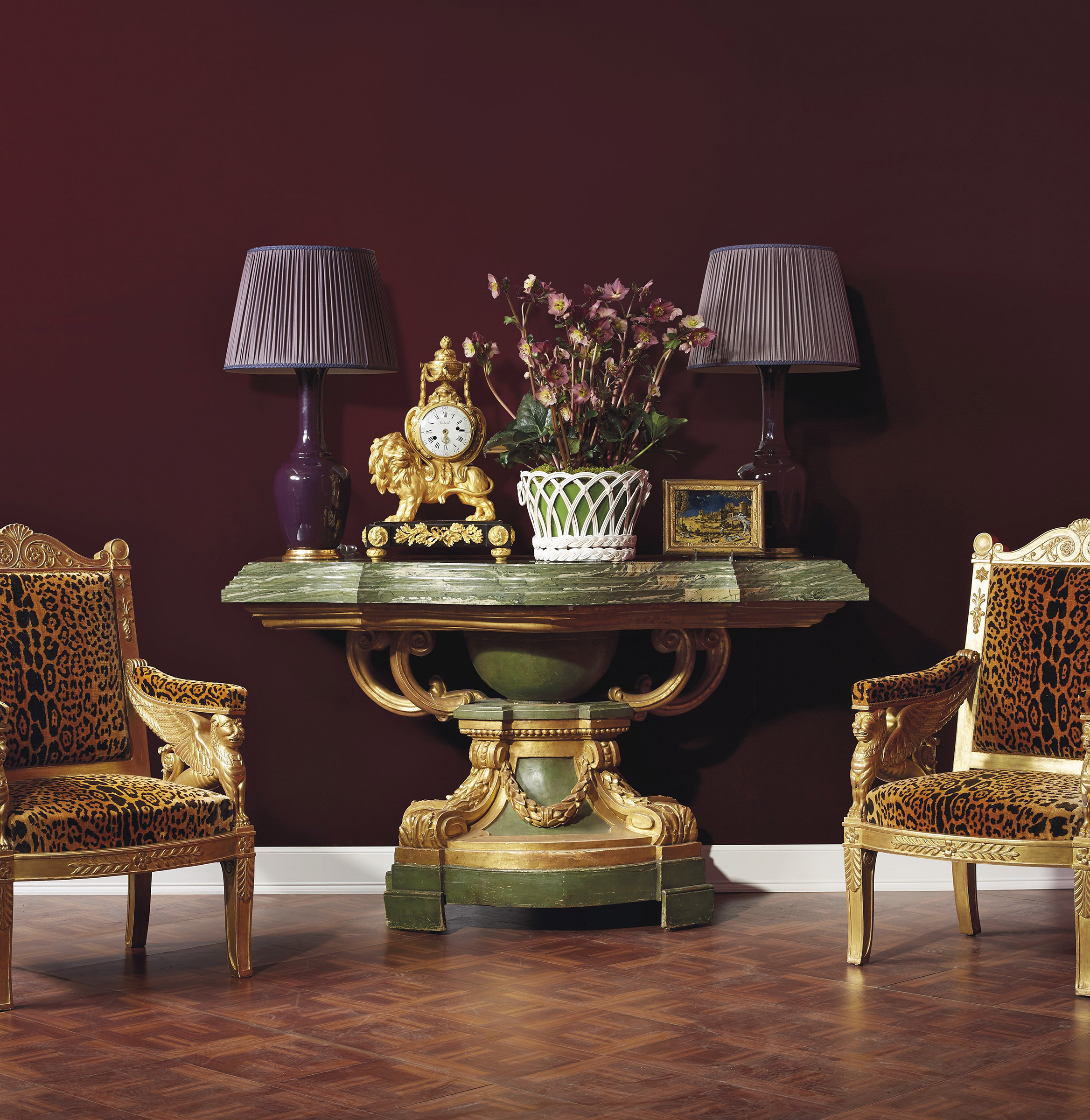 A pair of Dutch verre églomisé hunting scenes by Jonas Zeuner, circa 1780. Estimate: $8,000-12,000. A late Louis XV ormolu and ebonised mantel clock, circa 1760. Estimate: $4,000-6,000. A pair of Empire-style giltwood armchairs, 20th century. Estimate: $4,000-6,000. An Italian green-painted and parcel-gilt console table, late 18th century and later. Estimate: $5,000-8,000. All offered in The Collector, 28 April-7 May, Online 