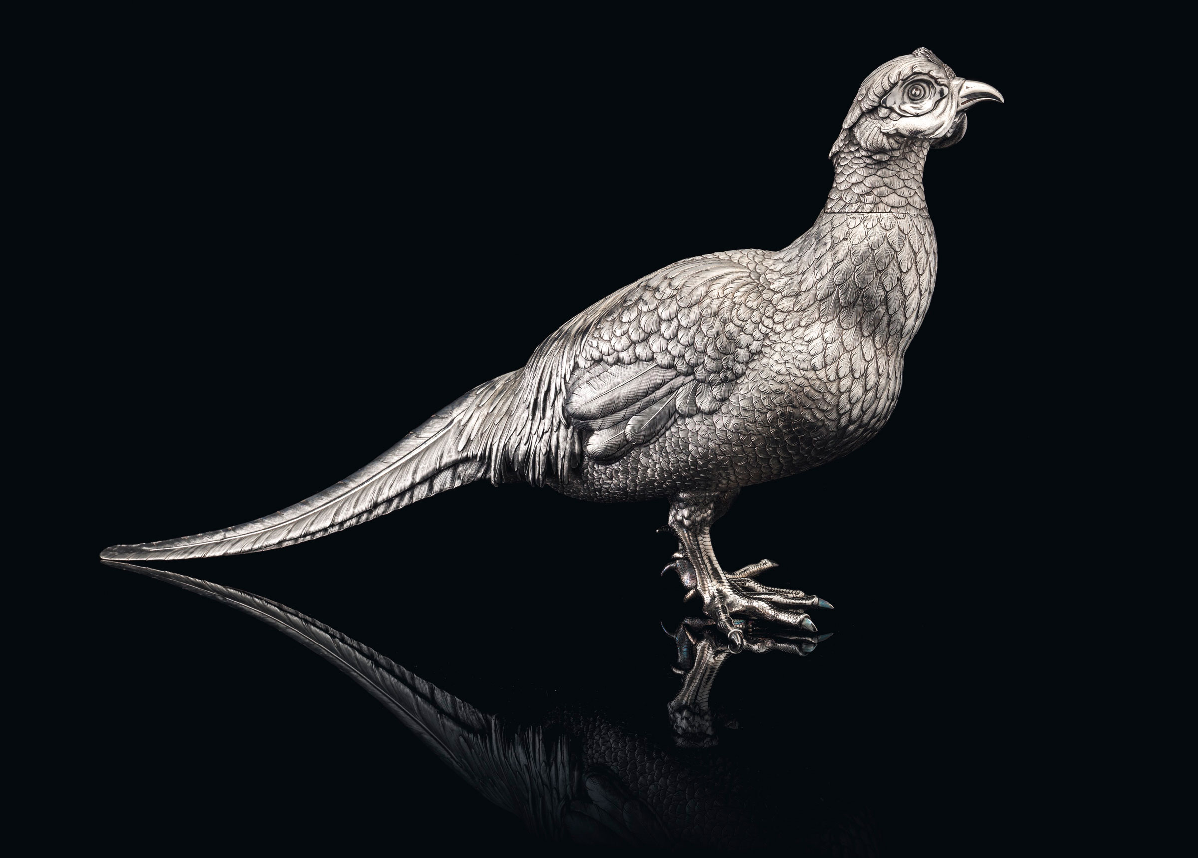 A large and rare silver pheasant decanter by Fabergé, with the workmaster’s mark of Julius Rappoport, circa 1890