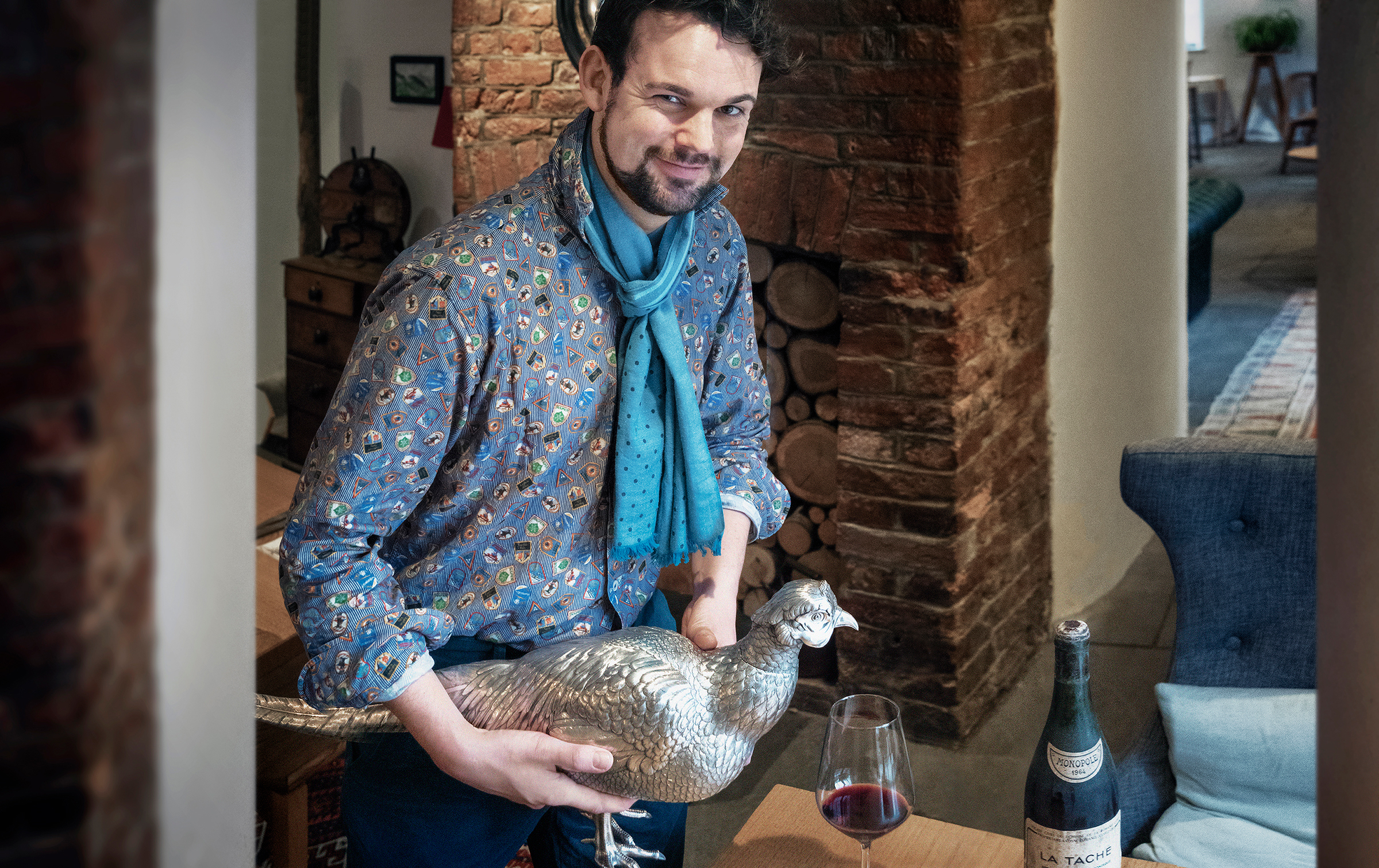Christie’s specialist Charles Foley with a large and rare silver pheasant decanter by Fabergé