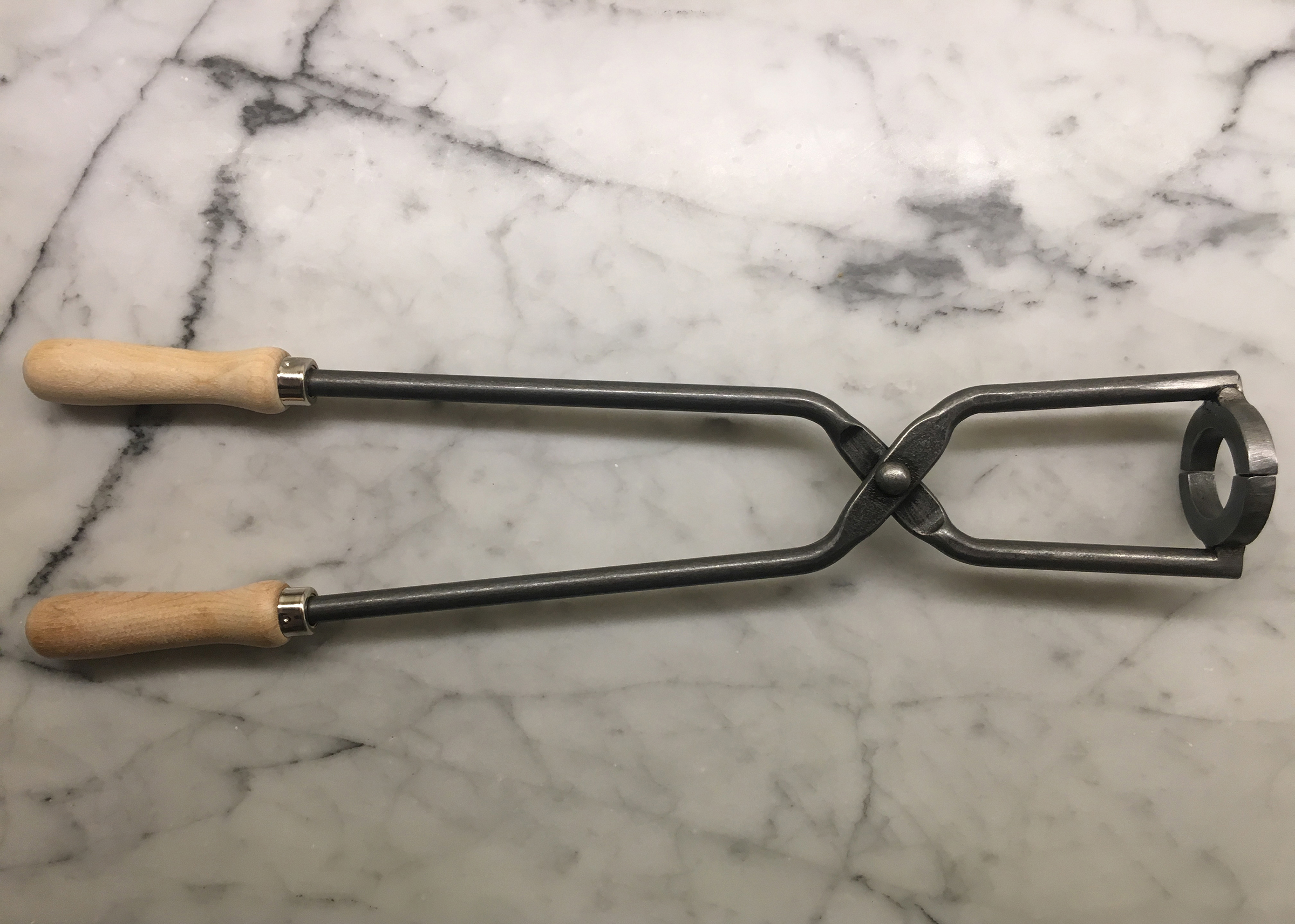 Port tongs ease the problem of dealing with saturated corks. Photo: Courtesy of PortTongs.com