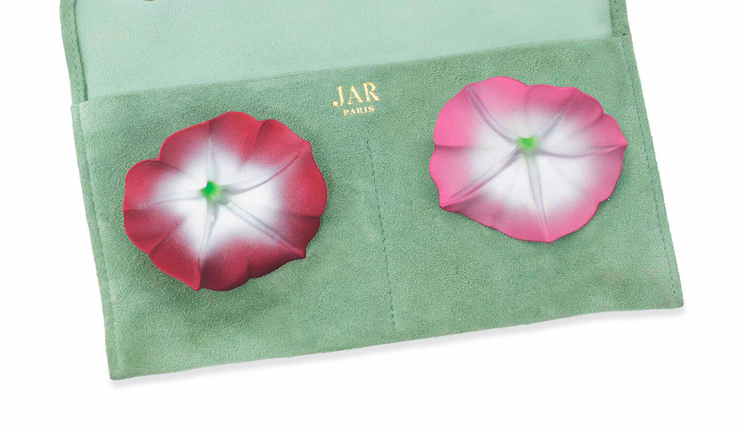 A pair of aluminium 'Morning Glory' ear clips, by Jar. Designed as a pair of bi-coloured aluminium morning glory flowers, clip fittings, 5.8cm, in JAR Paris light green suede pouch. Sold for £5,000 on 13 June 2017 at Christie’s in London