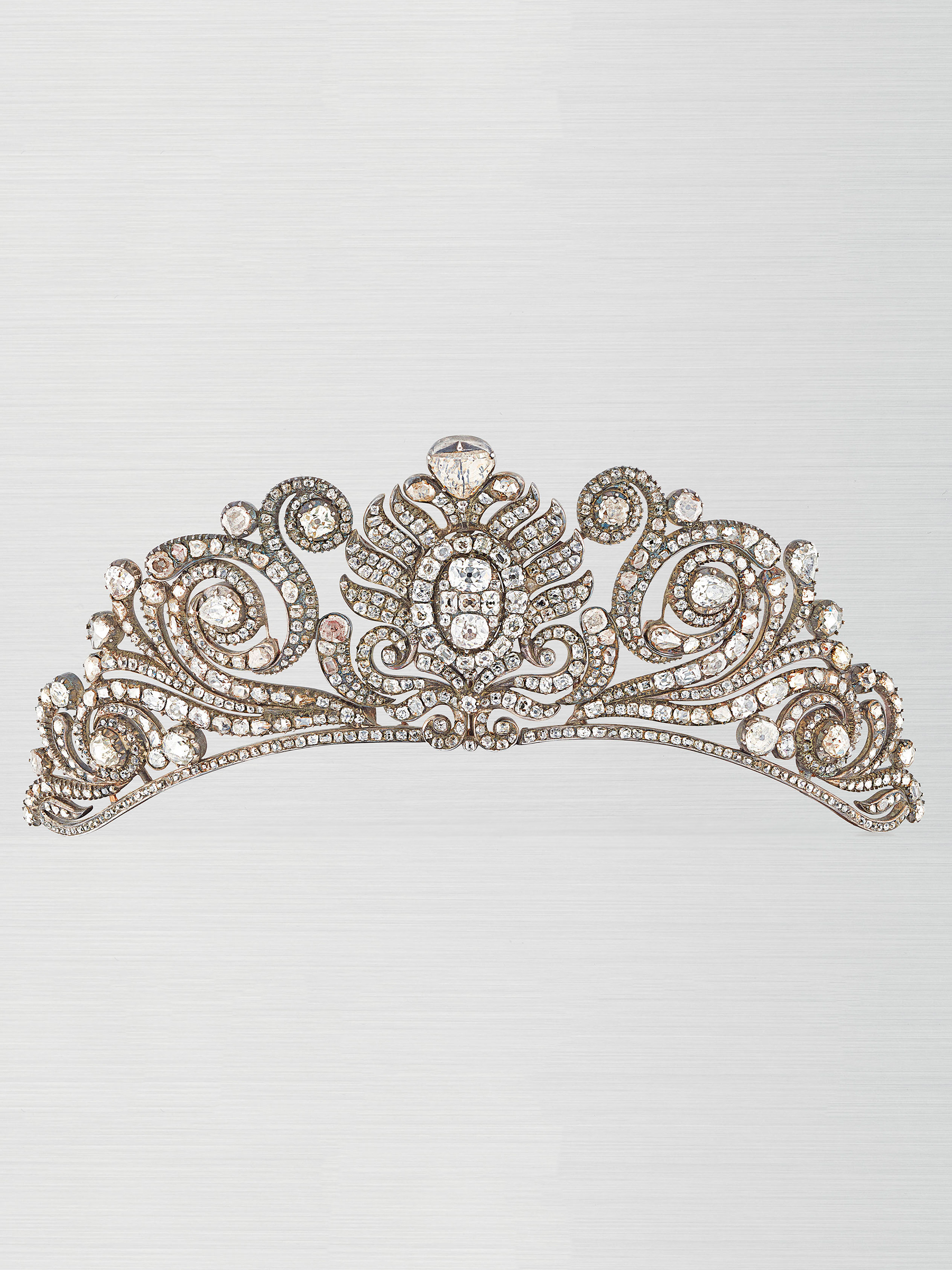 A rare late 18th/early 19th century diamond tiara. Old and rose-cut diamonds, closed-set in silver and gold, velvet covered tiara frame, circa 1800. Sold for £162,500 on 12 June 2019 at Christie’s in London