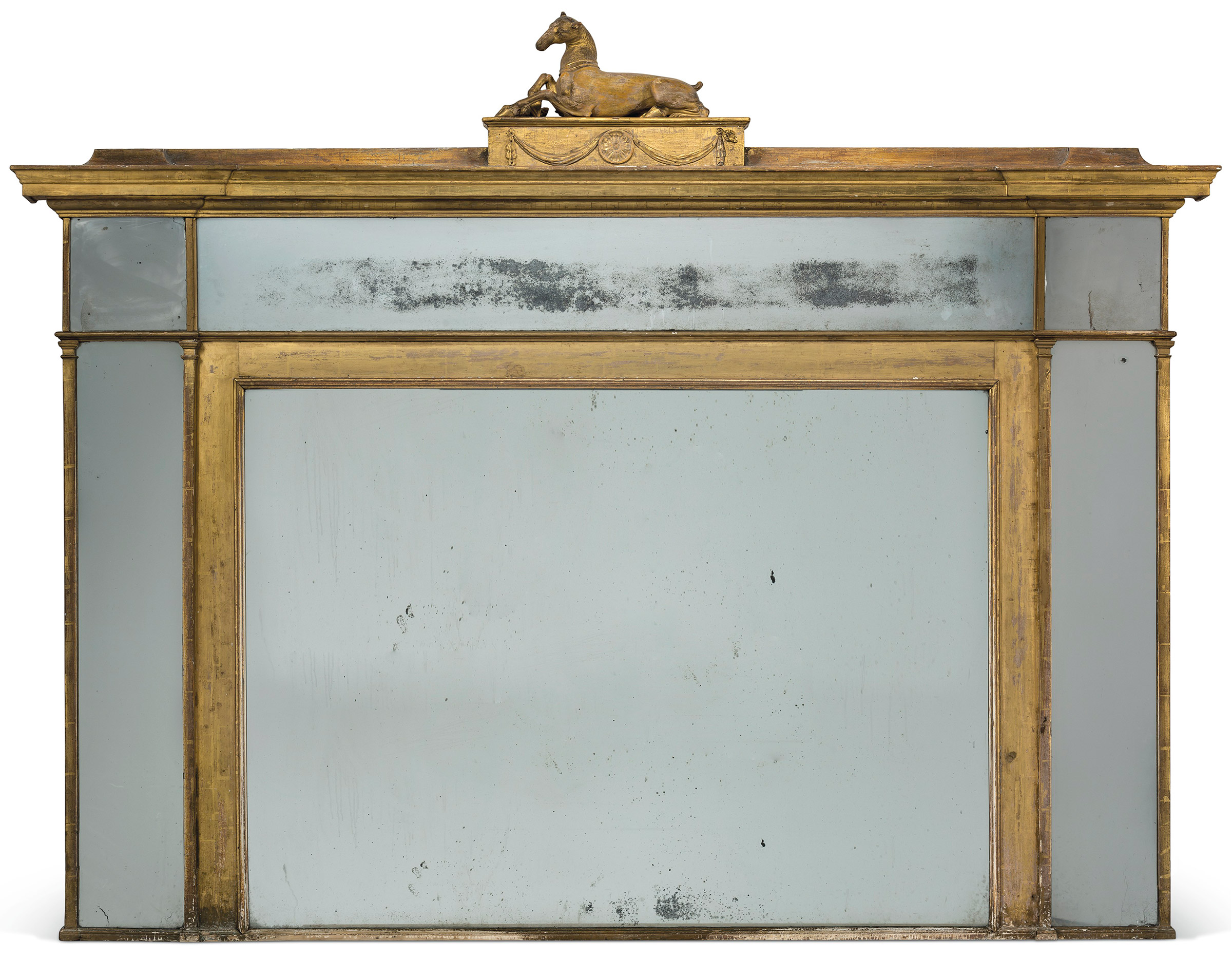 A George III giltwood overmantel mirror, designed by Robert Adam for Apsley House, London, for Henry, 2nd Earl Bathurst, 1778, the carved elements attributed to Sefferin Nelson. 58 x 74 in (147.5 x 188 cm). Estimate: £10,000-15,000. Offered in Gloria: Property from the late Dowager Countess Bathurst on 22 July at Christie’s in London