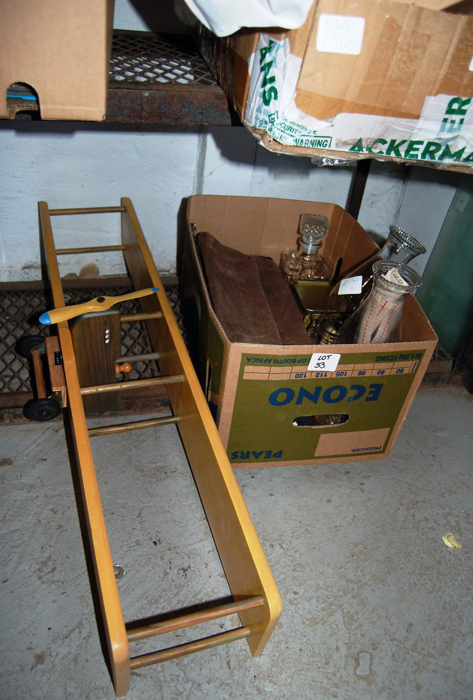 The box of odds and ends in which Susini’s Peasant Resting on His Staff was included also contained vases and a decanter 