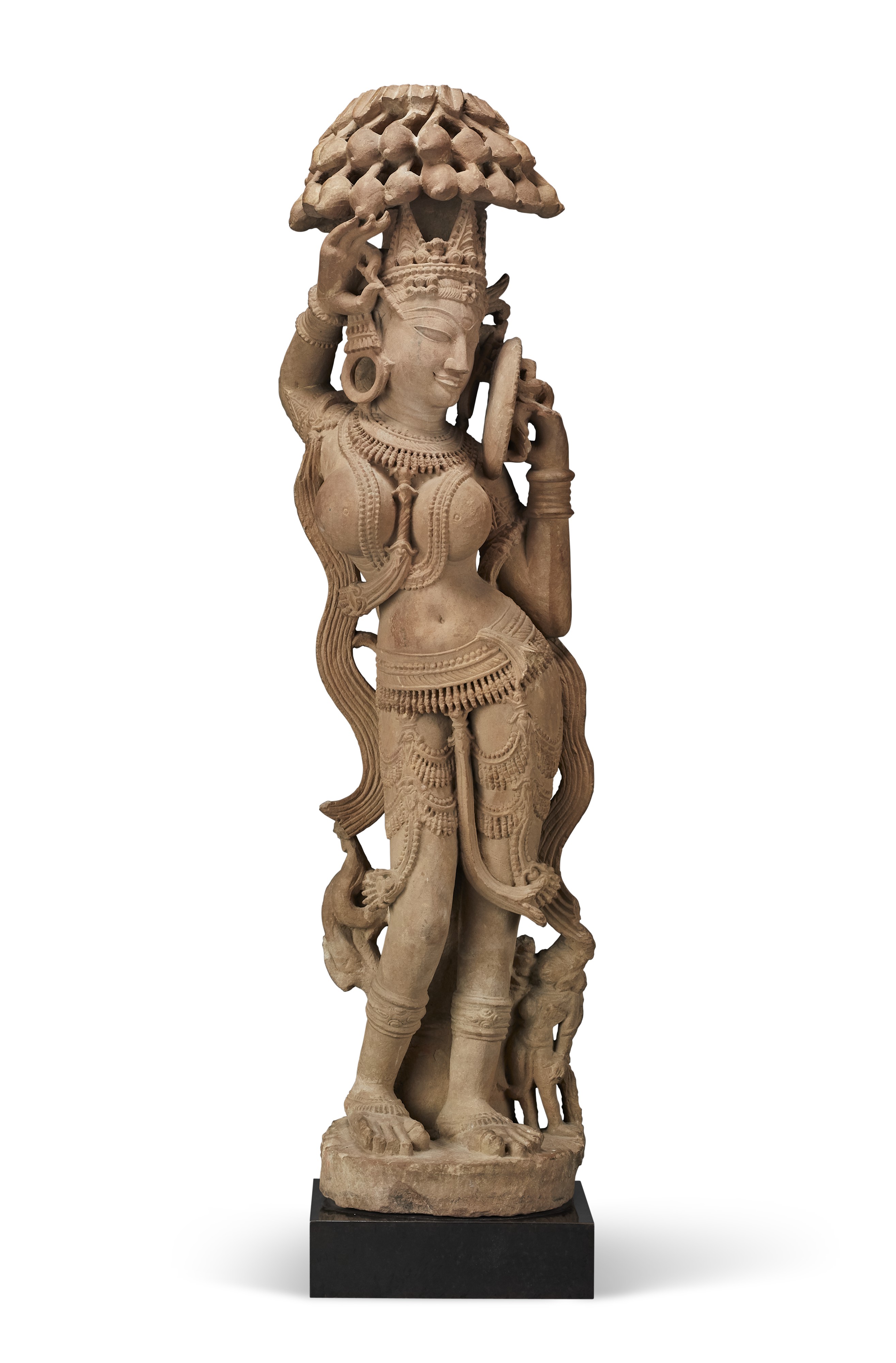 A buff sandstone figure of a Yakshi, central India, Madhya Pradesh or Uttar Pradesh, 11th century. 34 in (86.4 cm) high. Sold for $500,000 on 24 September 2020 at Christie’s in New York
