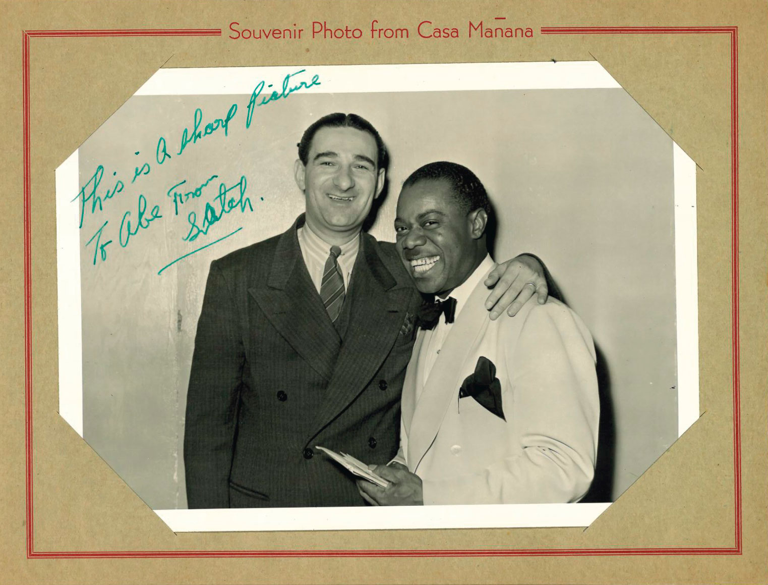A photograph of Abe Donin, the father of Duke Donin, and Louis Armstrong inscribed by Armstrong with the words: ‘This is a sharp picture. To Abe from Satch’