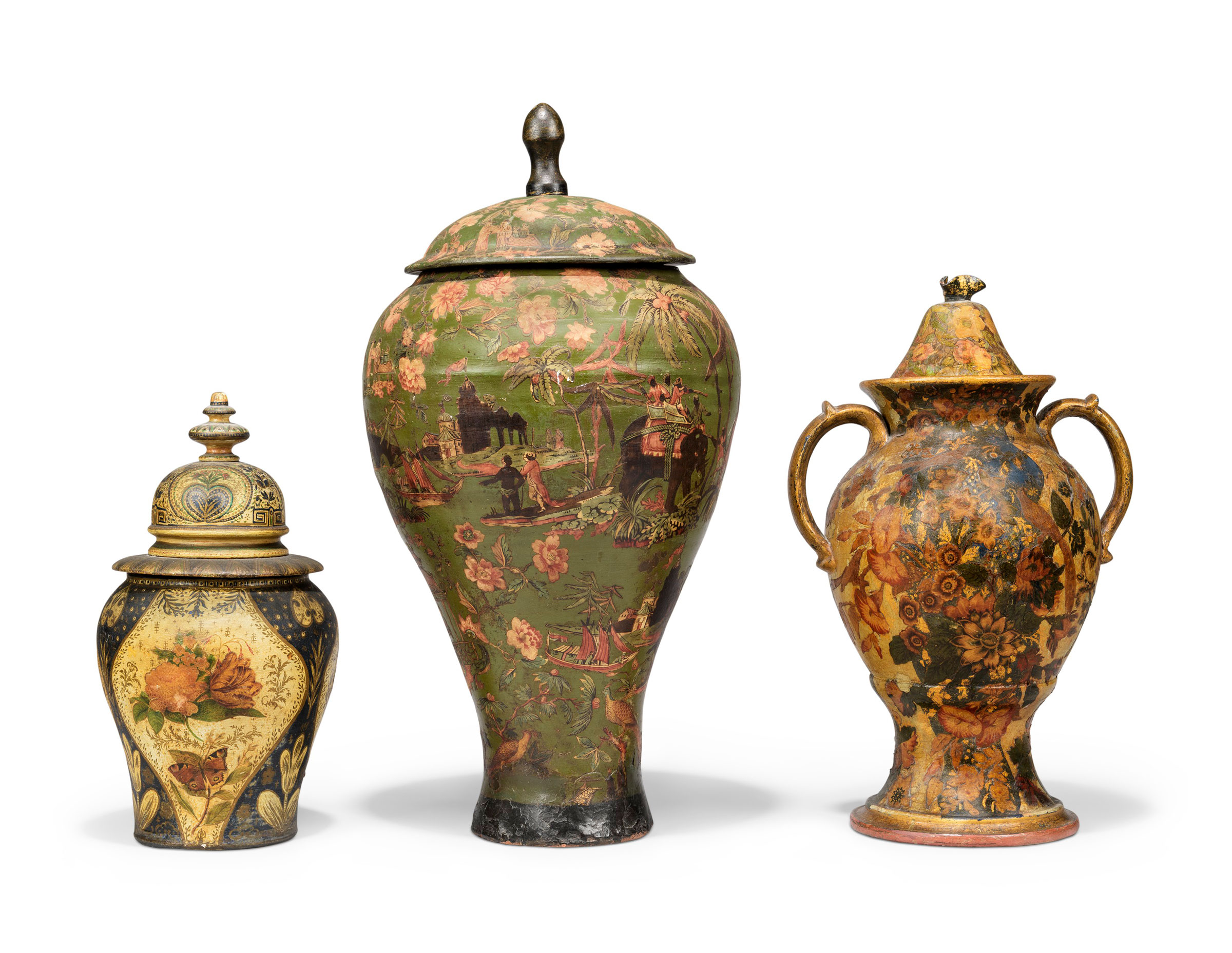 Three North European decorated and painted lidded jars, mid-19th century. The largest: 31 in (79 cm) high. The smaller two: 19 in (48 cm) and 24 in (61 cm) high. Estimate: £1,000-2,000. Offered in Alexandra Tolstoy: An Interior by Sibyl Colefax & John Fowler, 4-25 November, Online