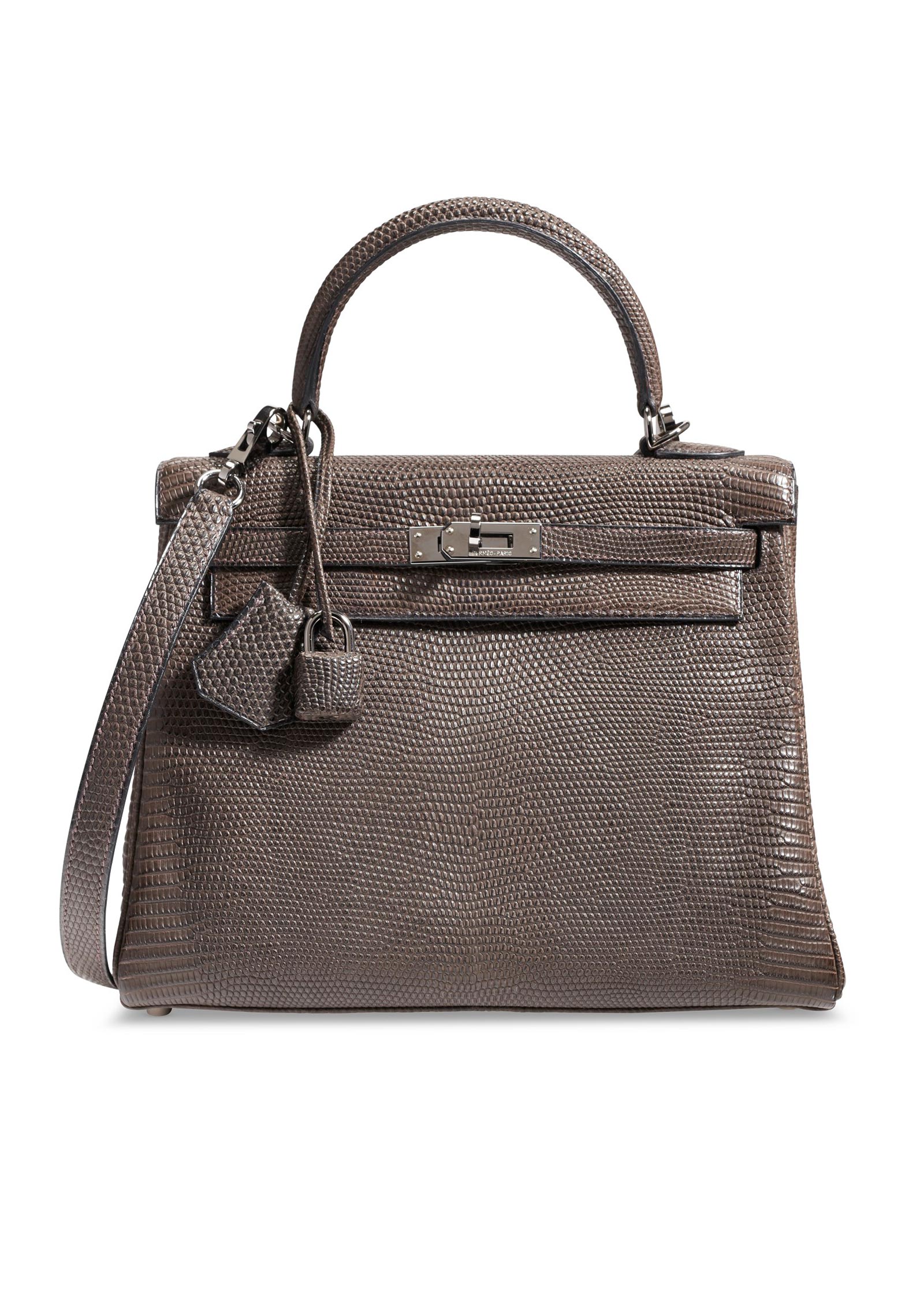 A matte ébène salvator lizard retourné Kelly 25 with ruthenium hardware, Hermès, 2005, from the collection of Susan Casden. 25 w x 18 h x 9 d cm. Sold for $37,500 in Handbags & Accessories Online: The New York Edition, 24 November-10 December 2020, Online