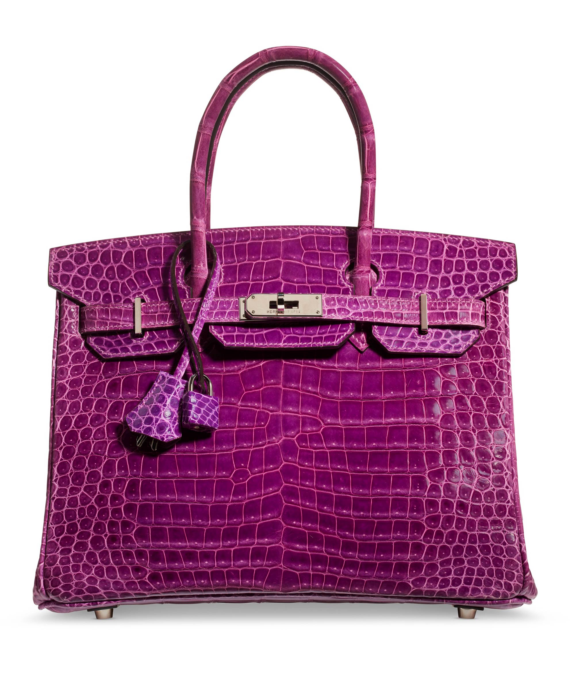 A shiny violet porosus crocodile Birkin 30 with palladium hardware, Hermès, 2005, from the collection of Susan Casden. 30 w x 22 h x 15 d cm. Sold for $47,500 in Handbags & Accessories Online: The New York Edition, 24 November-10 December 2020, Online