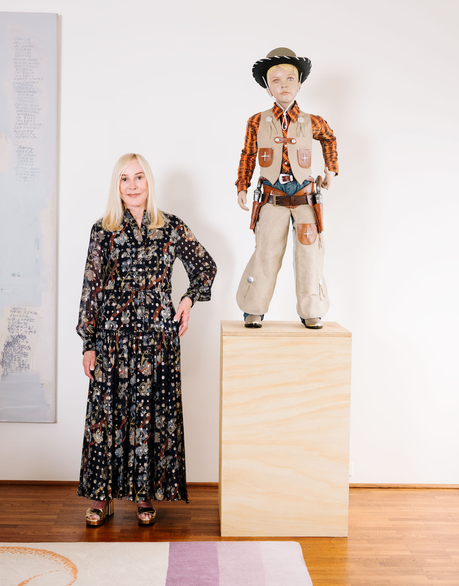 Gael Neeson with Richard Prince, Untitled (Cowboy), 2011-13, and a partial view of Prince's Double Nurse, 2001