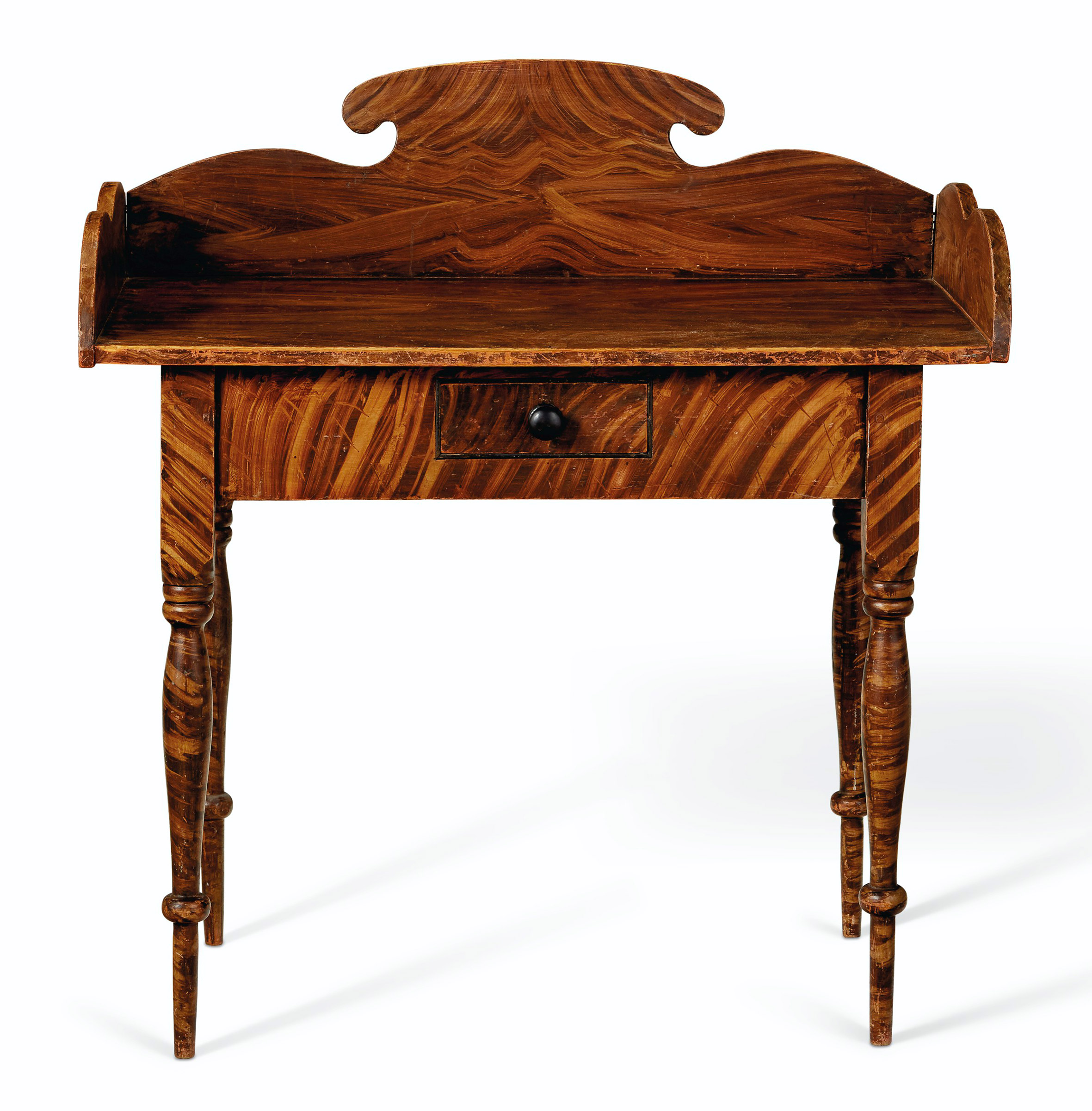A grain-painted pine Federal dressing table, Maine or New Hampshire, early 19th century. 37 in high, 35&frac12; in wide, 20&frac14; in deep. Sold for $5,625 on 22 January 2021 at Christie&rsquo;s in New York