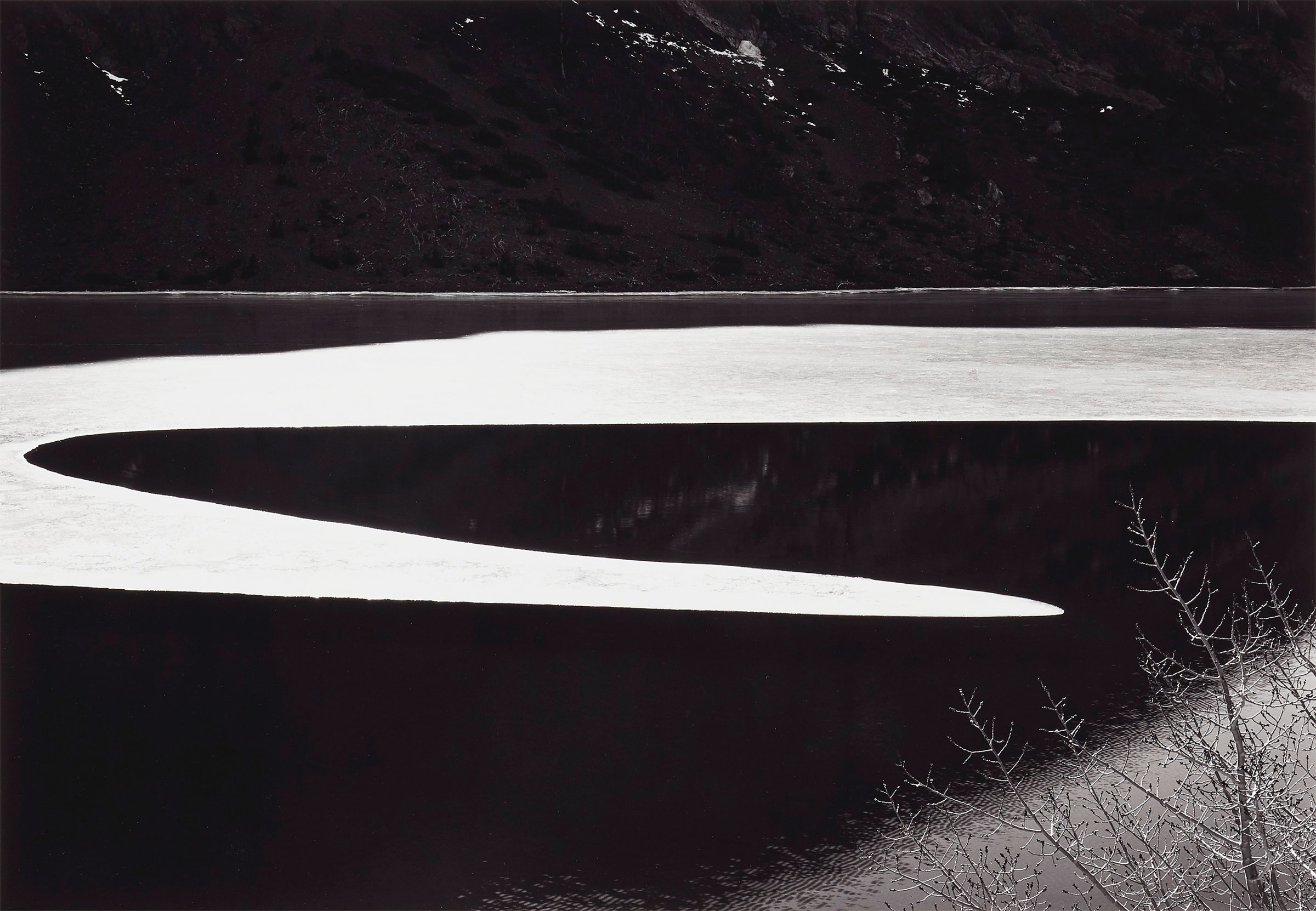 Ansel Adams (1902-1984), Ice on Ellery Lake, Sierra Nevada, California, c. 1959. Gelatin silver print, mounted on board, printed 1979. Image/sheet: 13 x 18 ¾ in (33 x 47.6 cm); mount: 22 x 28 in (55.8 x 71.1 cm). Estimate: $10,000-15,000. Offered in Ansel Adams and the American West, 25 March-8 April, Online