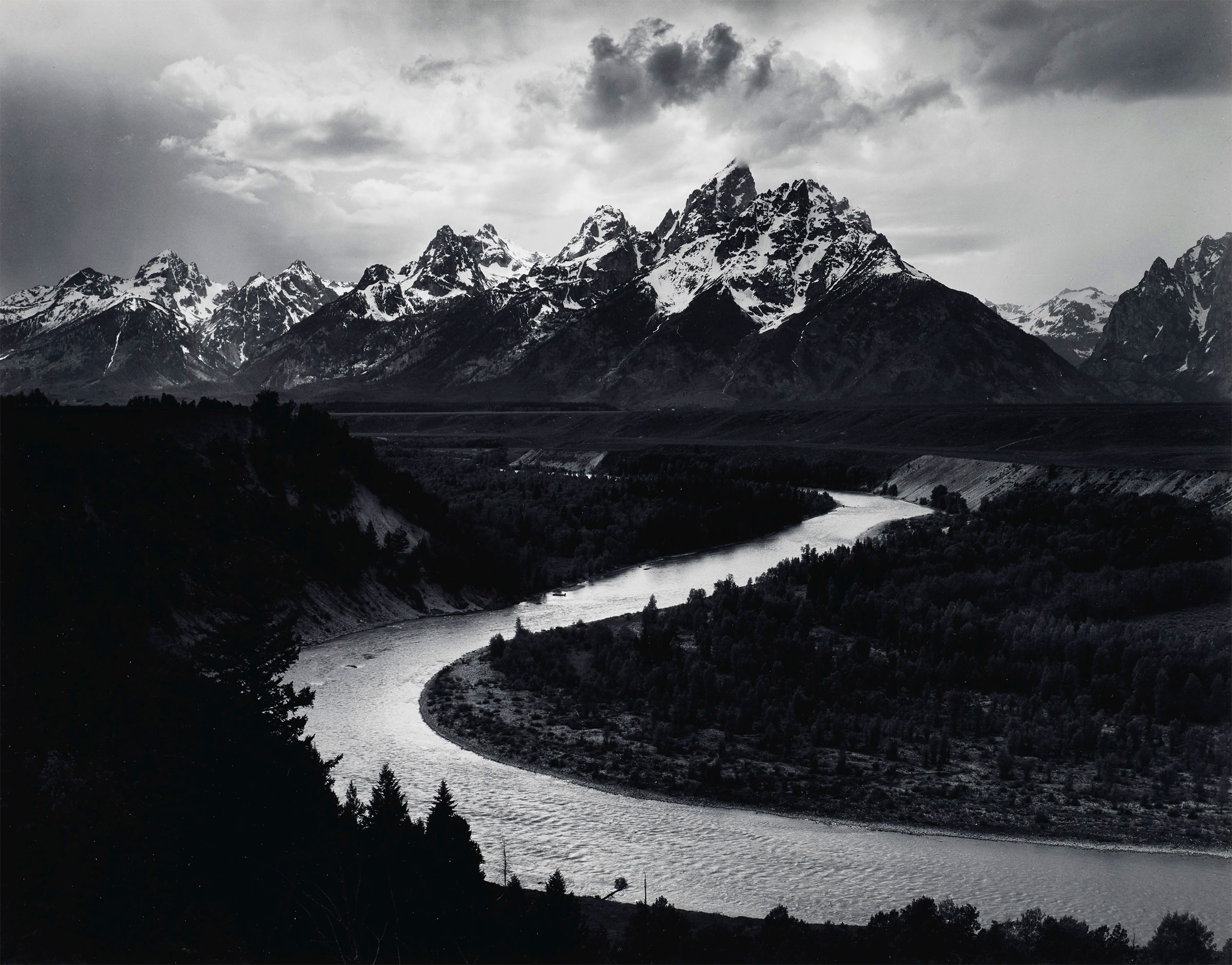 Ansel Adams (1902-1984). The Tetons and the Snake River, Grand Teton National Park, Wyoming, 1942. Gelatin silver print, mounted on board, printed probably 1963-1973. Image/sheet: 10½ x 13½ in (26.6 x 34.2 cm); mount: 14 x 18 in (35.5 x 45.7 cm). Photographs from the Center of Creative Photography. Estimate: $20,000-30,000. Offered in Ansel Adams and the American West, 25 March-8 April, Online