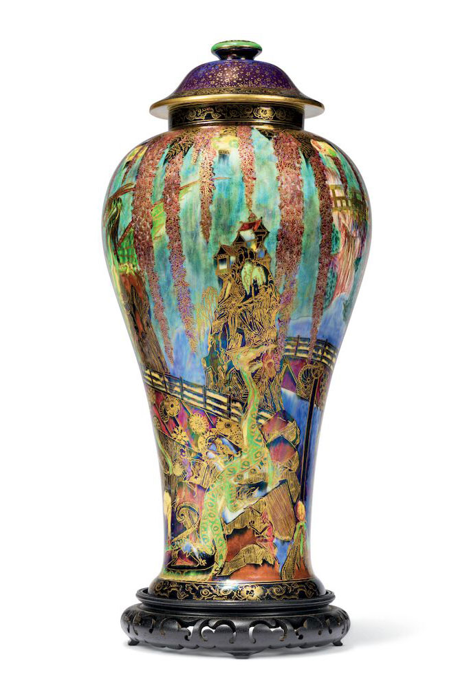 A large Wedgwood fairyland lustre 'Temple on a Rock' vase and cover, circa 1925. 20¼  in (51.5  cm) high overall. Sold for £25,000 on 19 May 2021 at Christie’s in London
