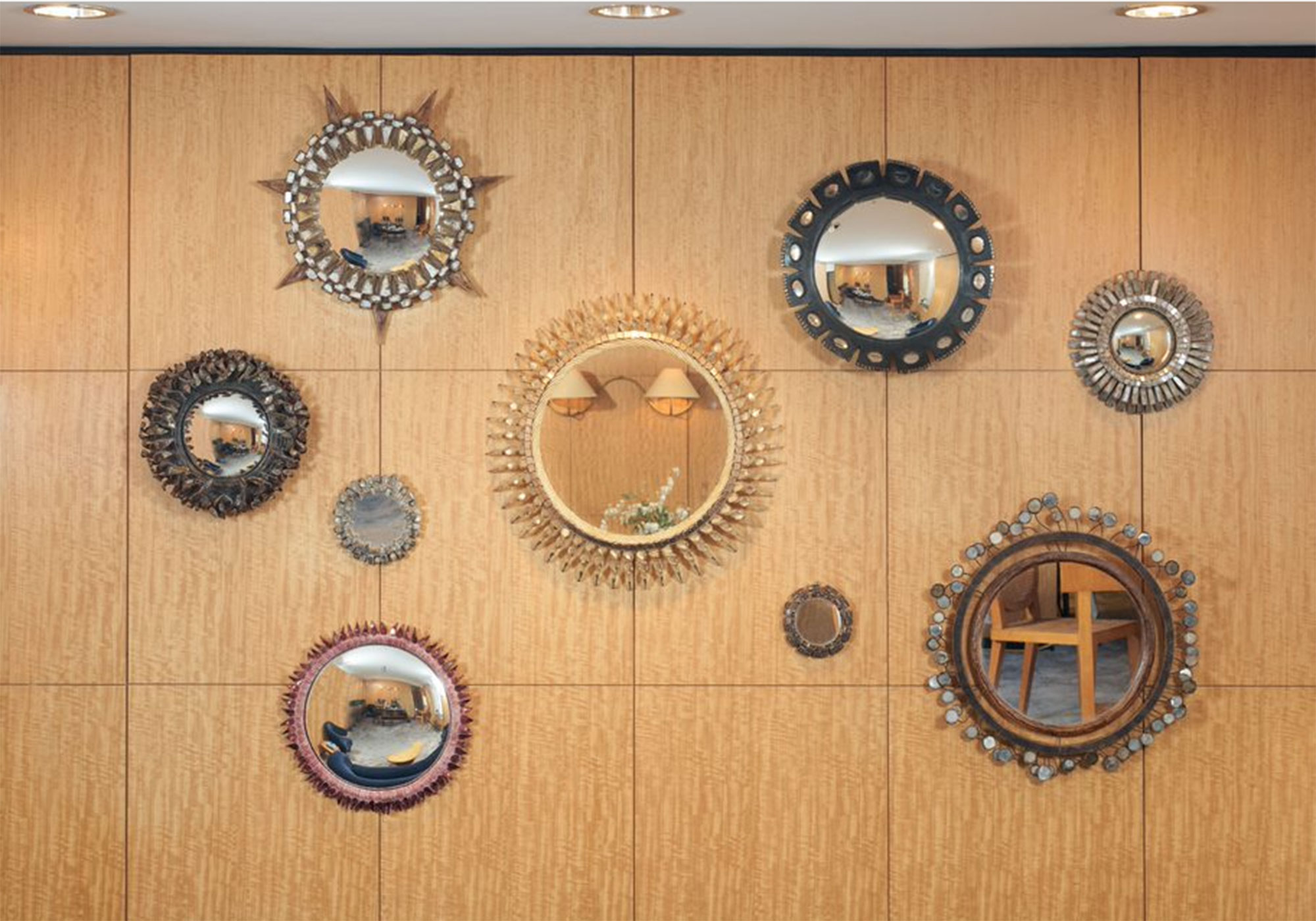 An array of Line Vautrin mirrors offered in Paris in New York: A Private Collection of Royère, Vautrin, Jouve on 26 May 2021 at Christie’s in New York