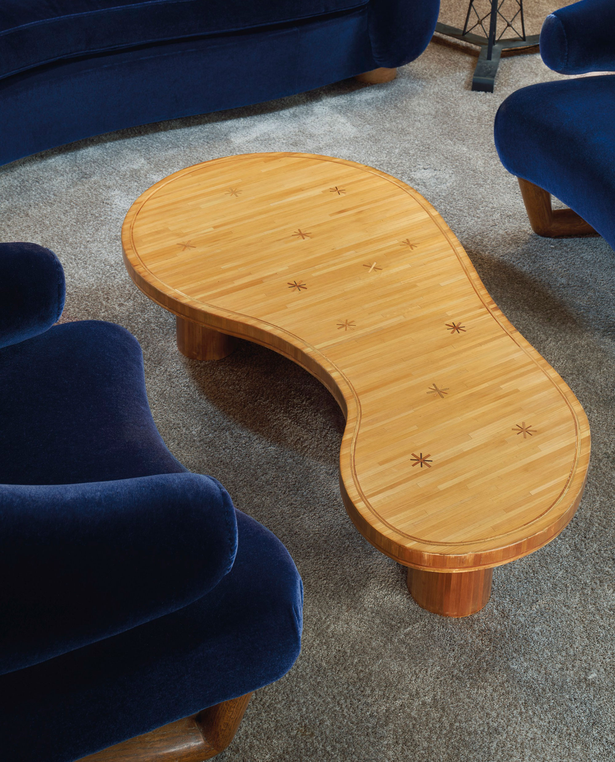 Jean Royère (1902-1981), ‘Flaque’ low table, c. 1959. 11¾ x 49¾ x 25⅝ in (29.8 x 126.3 x 65 cm). Estimate: $200,000-300,000. Offered in Paris in New York: A Private Collection of Royère, Vautrin, Jouve on 26 May 2021 at Christie’s in New York