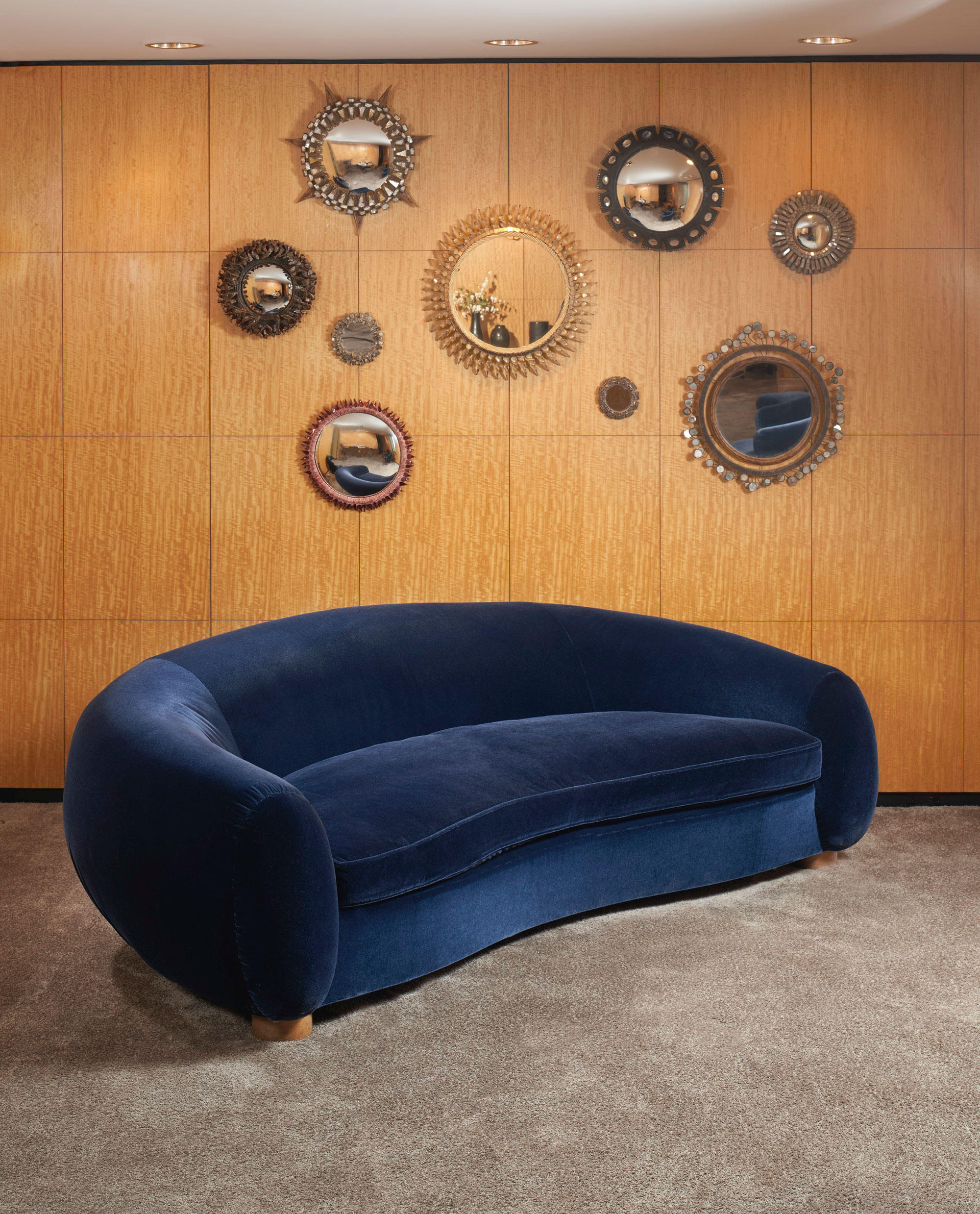 Jean Royère (1902-1981), ‘Ours Polaire’ sofa, c. 1950. 28¾ x 93 x 54 in (73 x 236.2 x 137.1 cm). Estimate: $400,000-600,000. Offered in Paris in New York: A Private Collection of Royère, Vautrin, Jouve on 26 May 2021 at Christie’s in New York