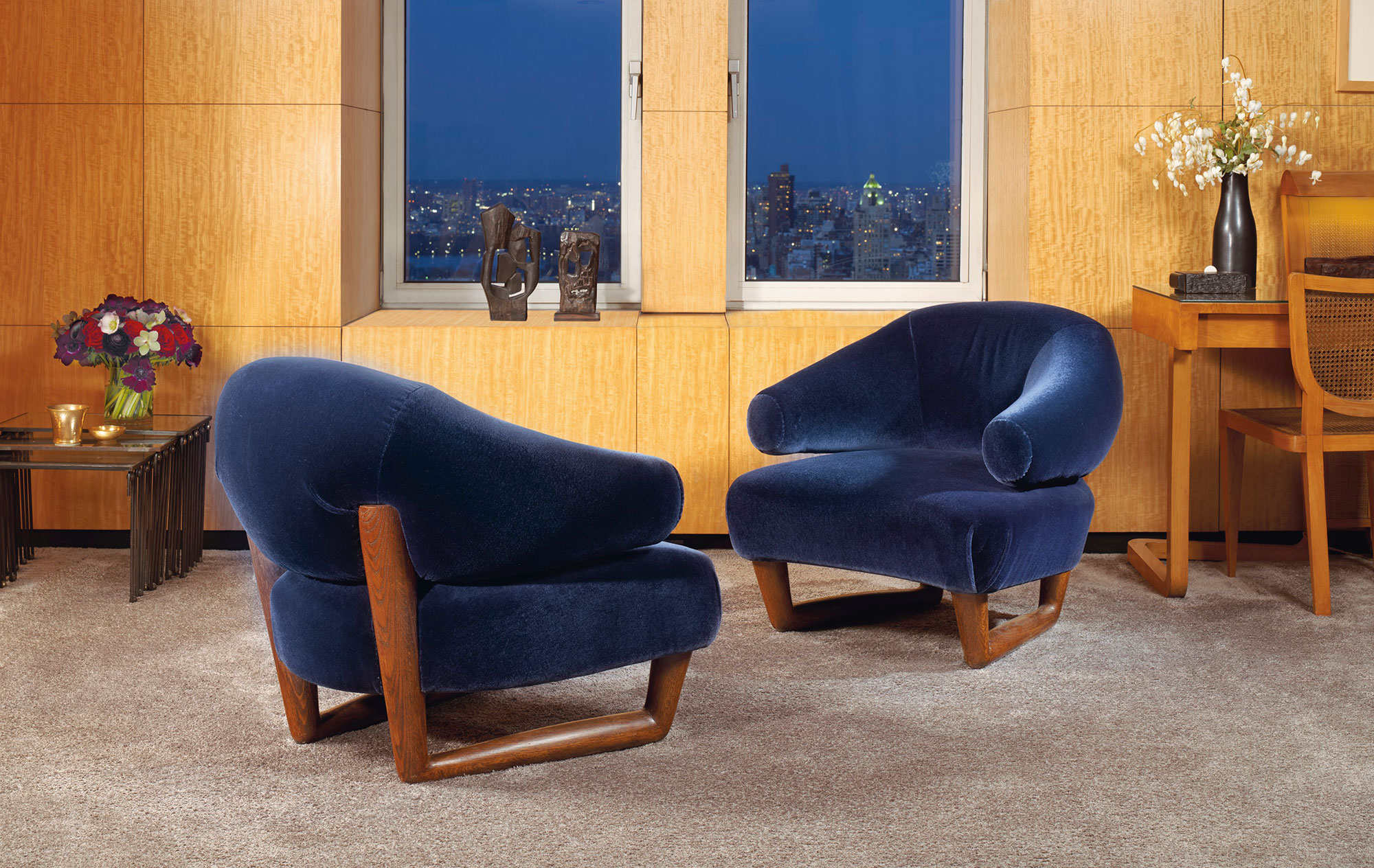 Jean Royère (1902-1981), pair of ‘Sculpture’ armchairs, c. 1955. 28½ x 31½ x 32 in (72.5 x 80 x 81.3 cm) each. Estimate: $200,000-300,000. Offered in Paris in New York: A Private Collection of Royère, Vautrin, Jouve on 26 May 2021 at Christie’s in New York