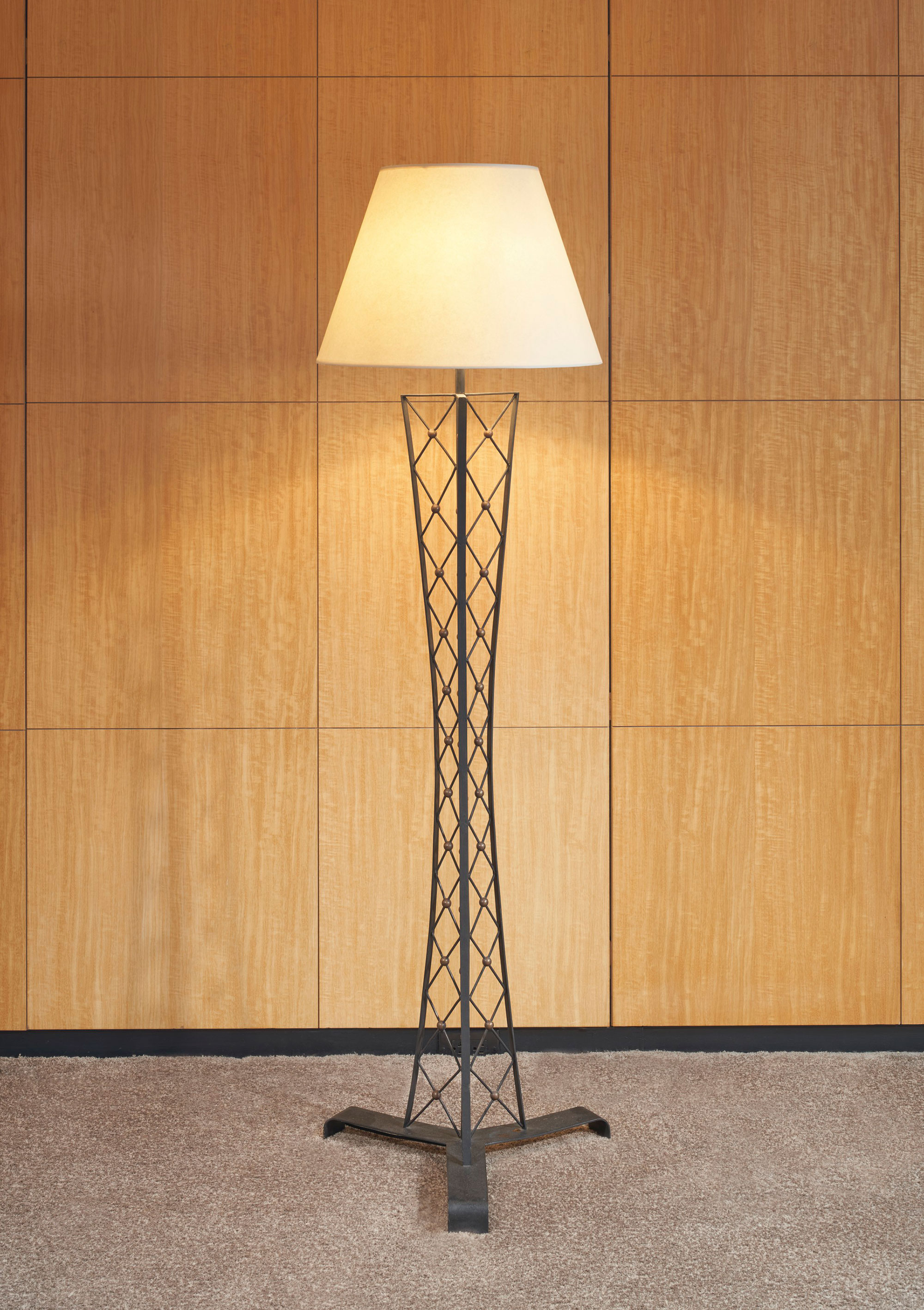 Jean Royère (1902-1981), ‘Tour Eiffel’ floor lamp, c. 1947, painted iron, gilt bronze, paper shade 62½ in (161.5 cm) high including shade; 18½ in (46.5 cm) diameter. Estimate: $100,000-150,000. Offered in Paris in New York: A Private Collection of Royère, Vautrin, Jouve on 26 May 2021 at Christie’s in New York