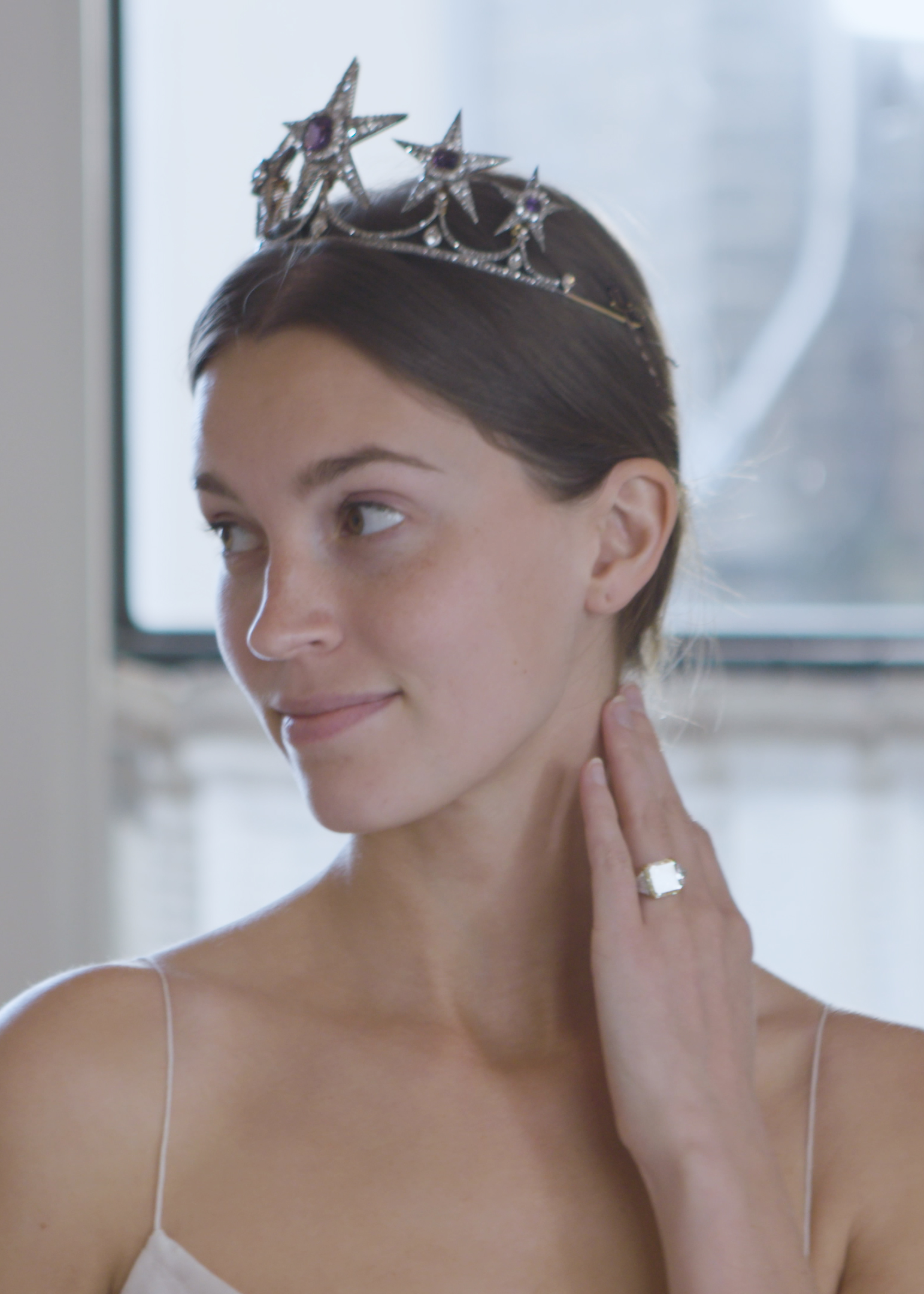 Tiaras make for the perfect bridal entrance. Many, like this one, are adaptable to multifunctional use