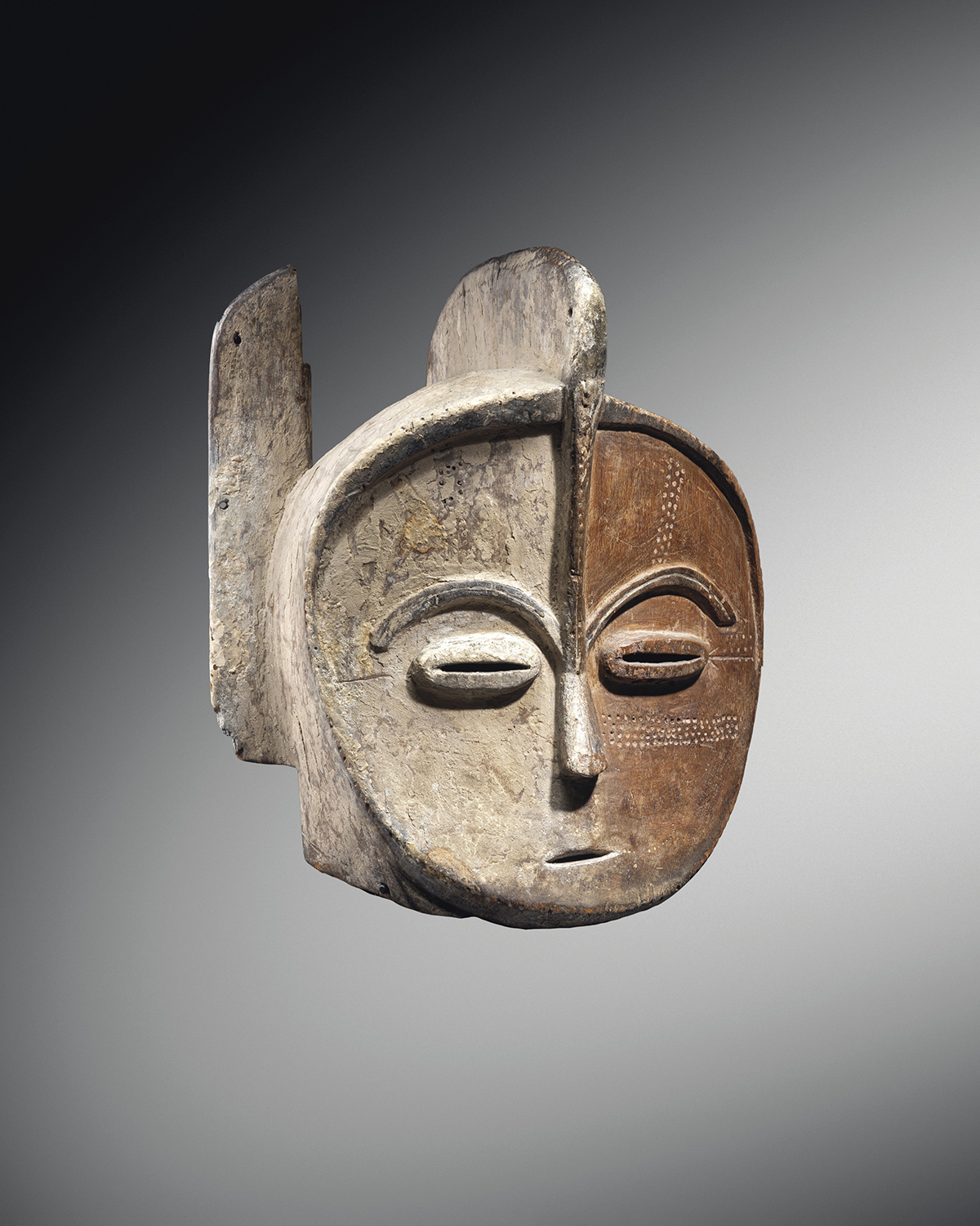 Kota helmet mask, Gabon. Height: 41.5 cm (16⅜ in). Estimate: €300,000-400,000. Offered in Collection Michel Périnet on 23 June 2021 at Christie’s in Paris