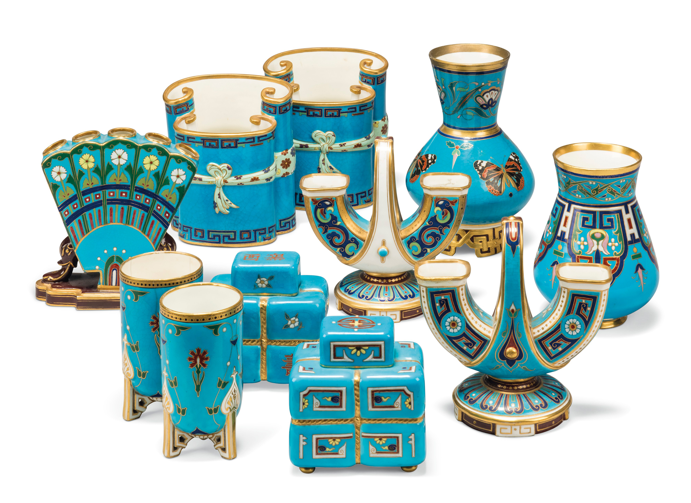 A collection of Minton porcelain turquoise-ground vases, circa 1870-90. Probably designed by Christopher Dresser, all with turquoise blue ground and cloisonn&eacute; decoration. The largest 8 in (20 cm) high. Sold for £4,000 on 30 September 2021 at Christie’s in London