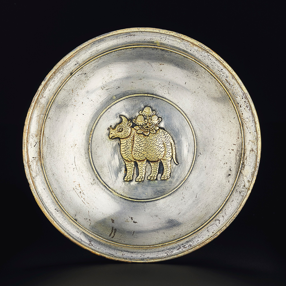 An exceptionally rare parcel-gilt silver 'rhinoceros' dish, Tang dynasty (AD 618-907). 6 in (15.2 cm) diameter. Estimate: $1,000,000-1,500,000. Offered in Important Chinese Ceramics and Works of Art on 23 September at Christie&rsquo;s in New York