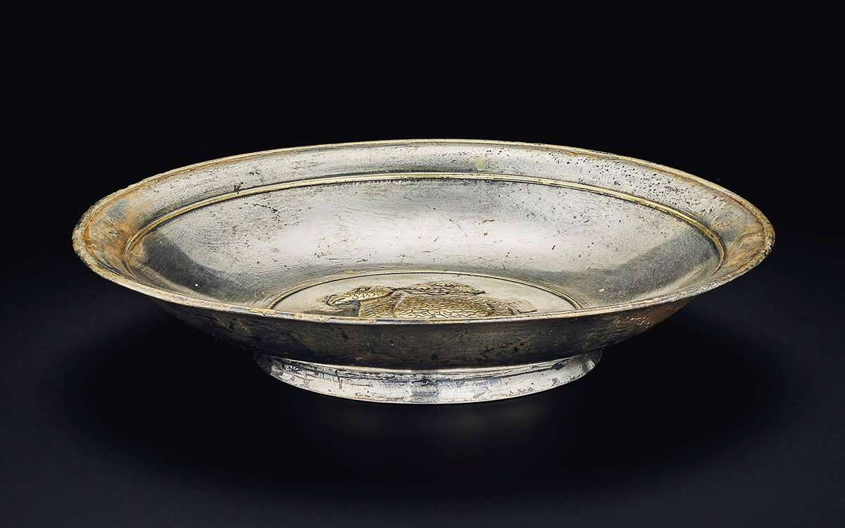 An exceptionally rare parcel-gilt silver 'rhinoceros' dish, Tang dynasty (AD 618-907). 6 in (15.2 cm) diameter. Estimate: $1,000,000-1,500,000. Offered in Important Chinese Ceramics and Works of Art on 23 September at Christie&rsquo;s in New York