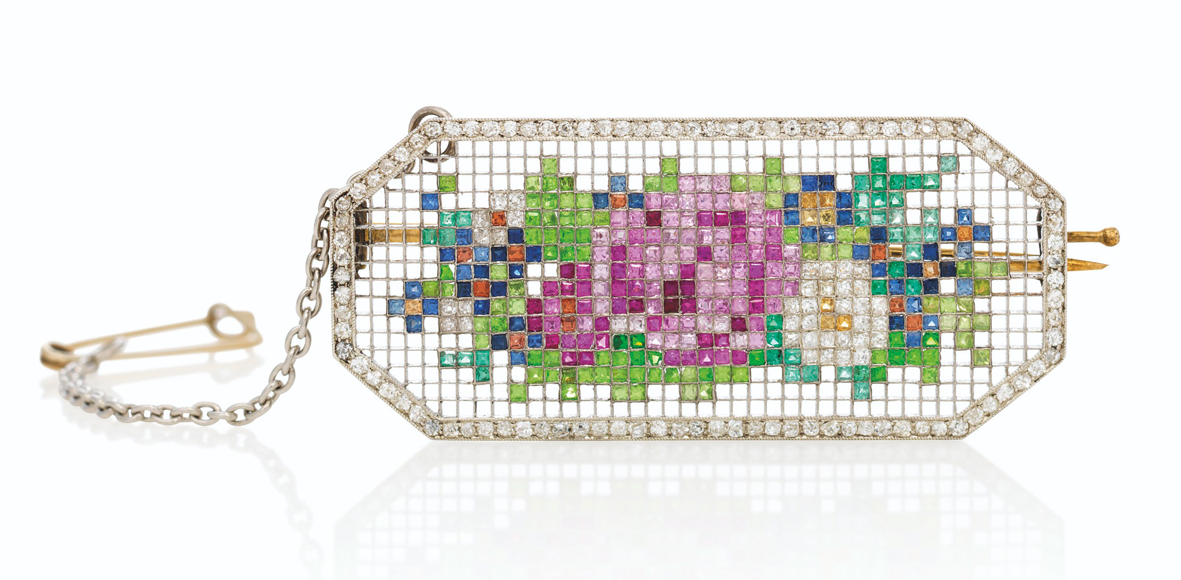 An important jewelled gold and platinum mosaic brooch, by Faberg&eacute;, circa 1913.&nbsp;1⅝  in (4.3  cm) long. Sold for £350,000 on 29 November 2021 at Christie’s in London