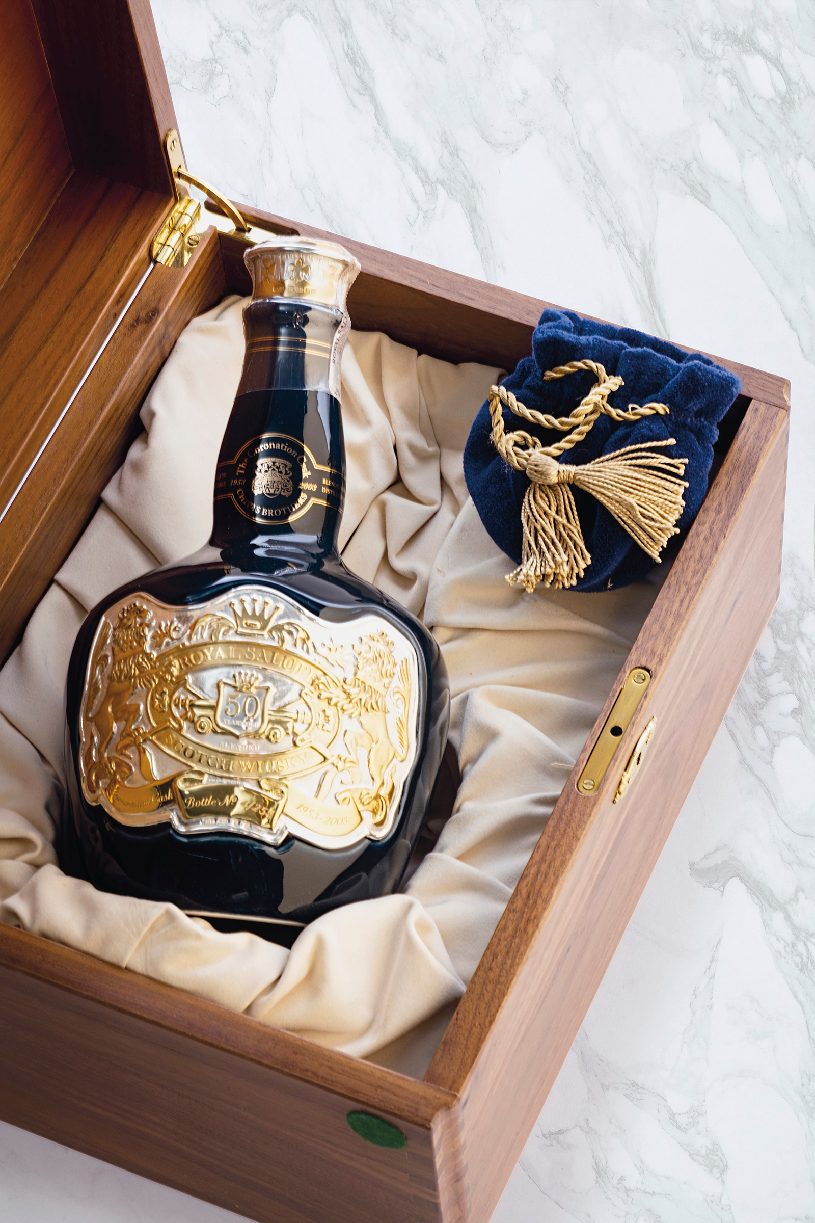 Royal Salute 50 Year Old Coronation Cask. Distilled 1953. Bottled 2003 to honour the Queen’s coronation. Bottle number 4 of 255. 1 bottle per lot. Sold for £24,500 on 3 December 2021 at Christie’s in London